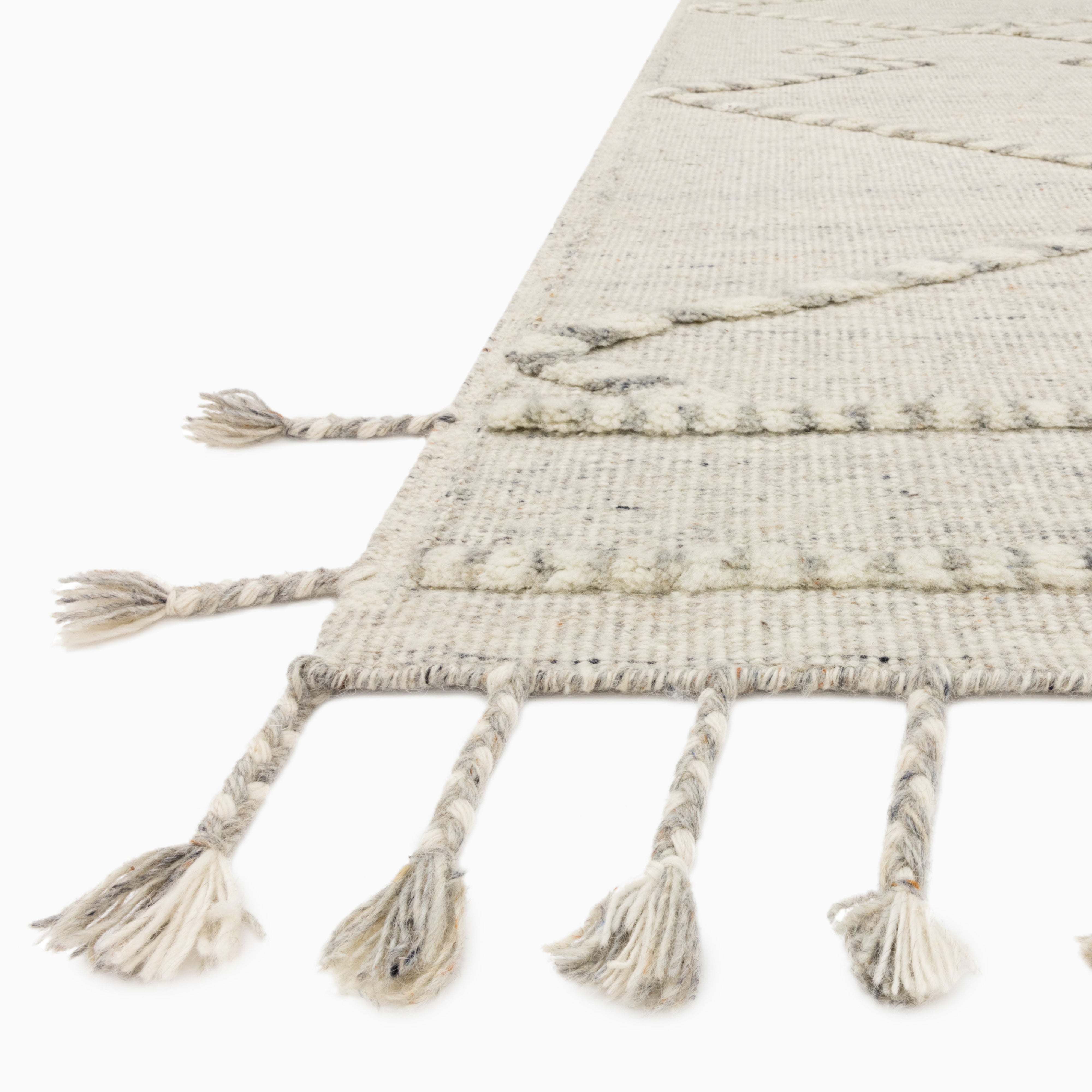 Micah Wool Blend Rug in Cream / Dove, blending neutral tones with a subtle diamond design and knotted fringe, ideal for relaxed, airy spaces.