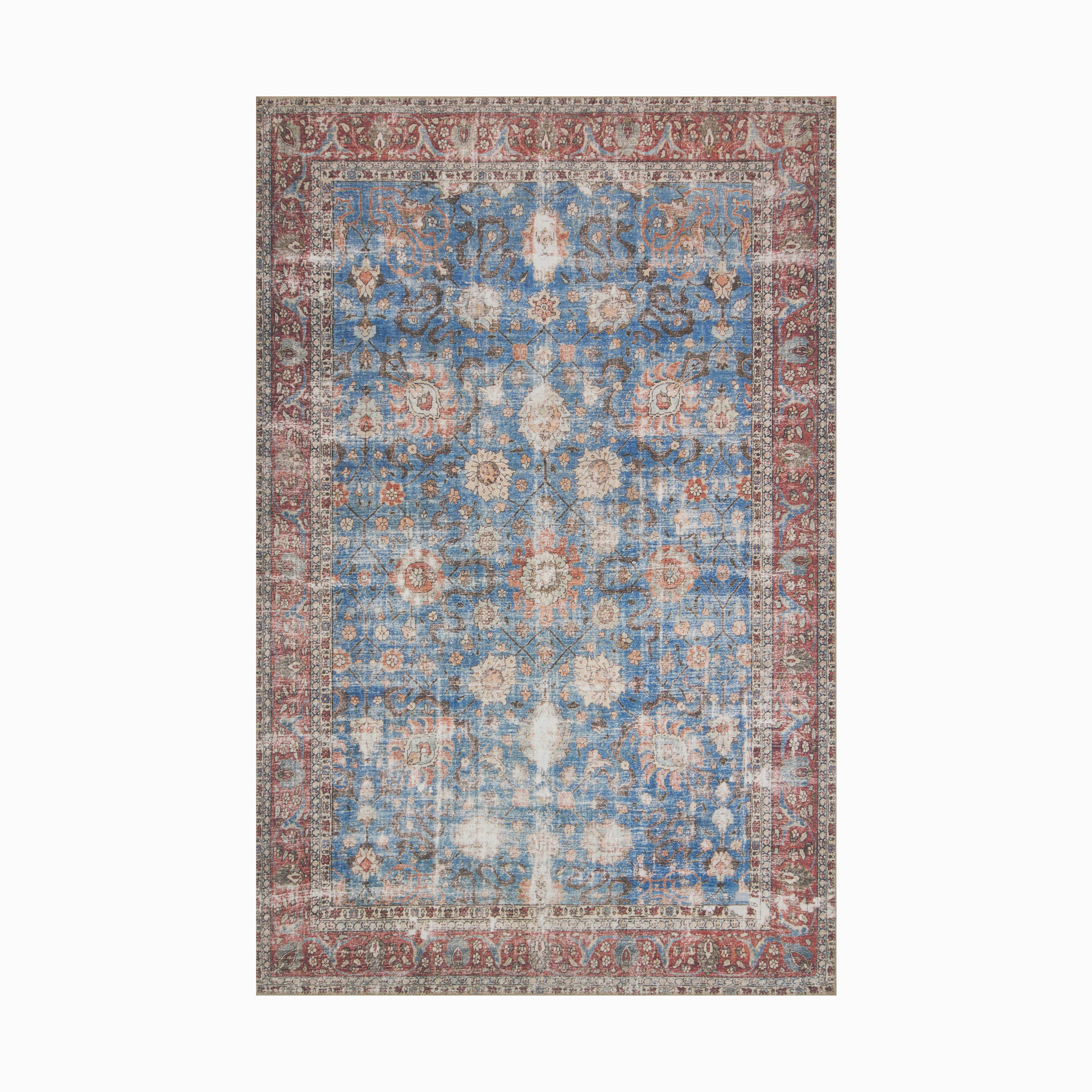 Transitional polyester face rug in denim blue and burgundy, crafted with a power-loomed technique for lasting resilience and a refined antique look.