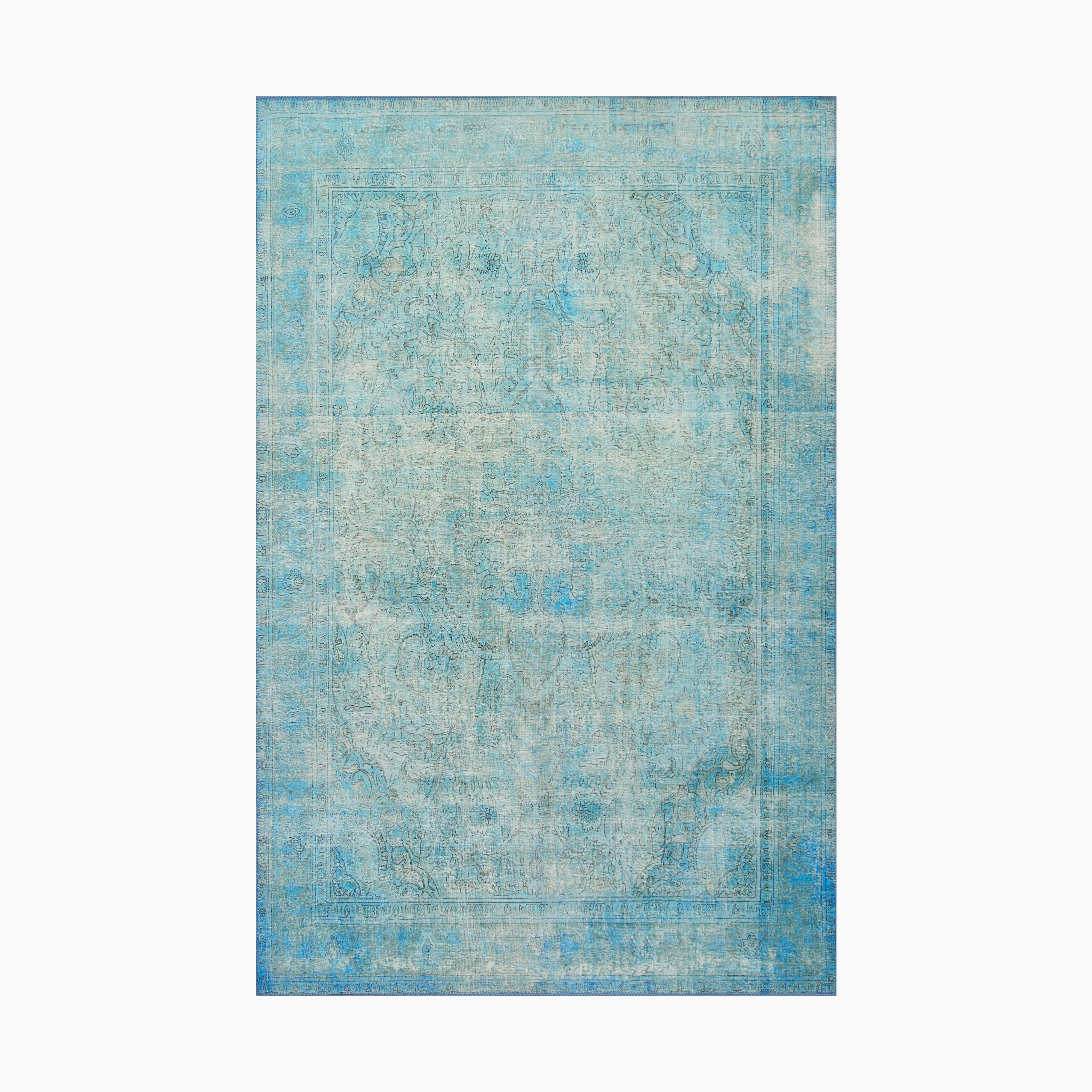 Transitional polyester face rug in vibrant lake blue, power-loomed for precision, blending soft textures with a vintage-inspired faded design.