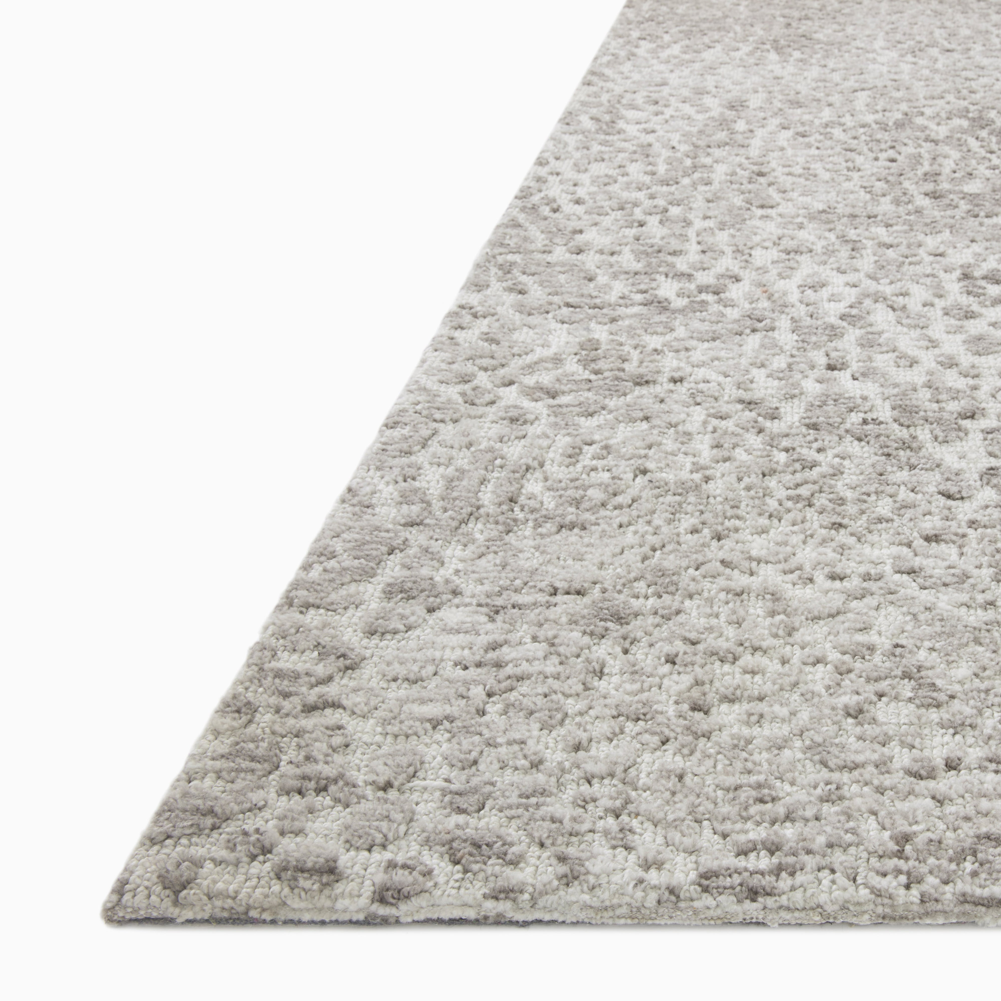 Rollins Polyester Pile Rug in Fog and Smoke, showcasing a misty gray background with an abstract, smoky pattern that enhances its rich texture.