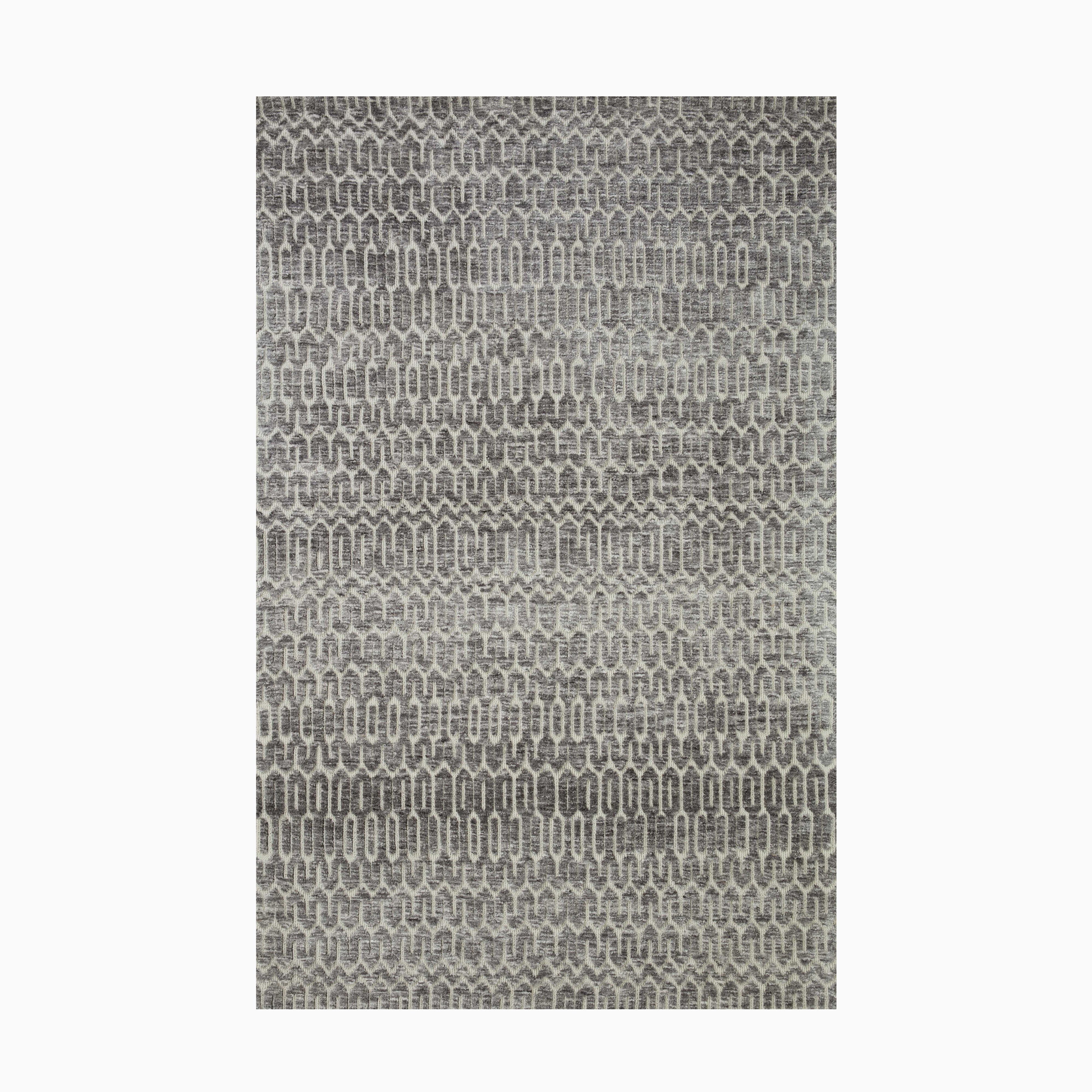 Power loomed transitional rug in dark gray and cream, crafted from polyester with a subtle yet striking design for versatile styling.