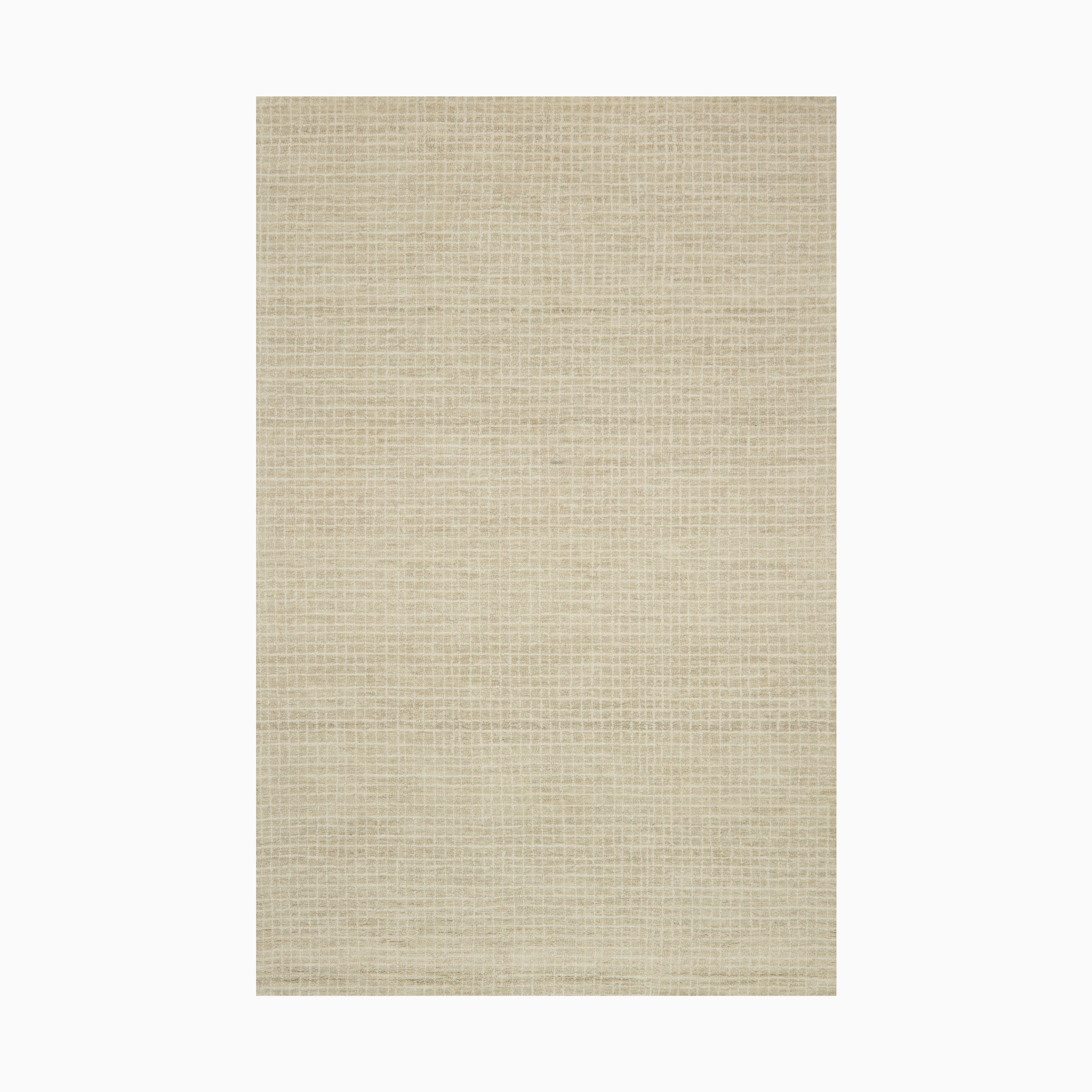 Transitional wool hooked rug in linen, featuring a soft neutral tone and a textured weave that adds warmth to modern and classic interiors.