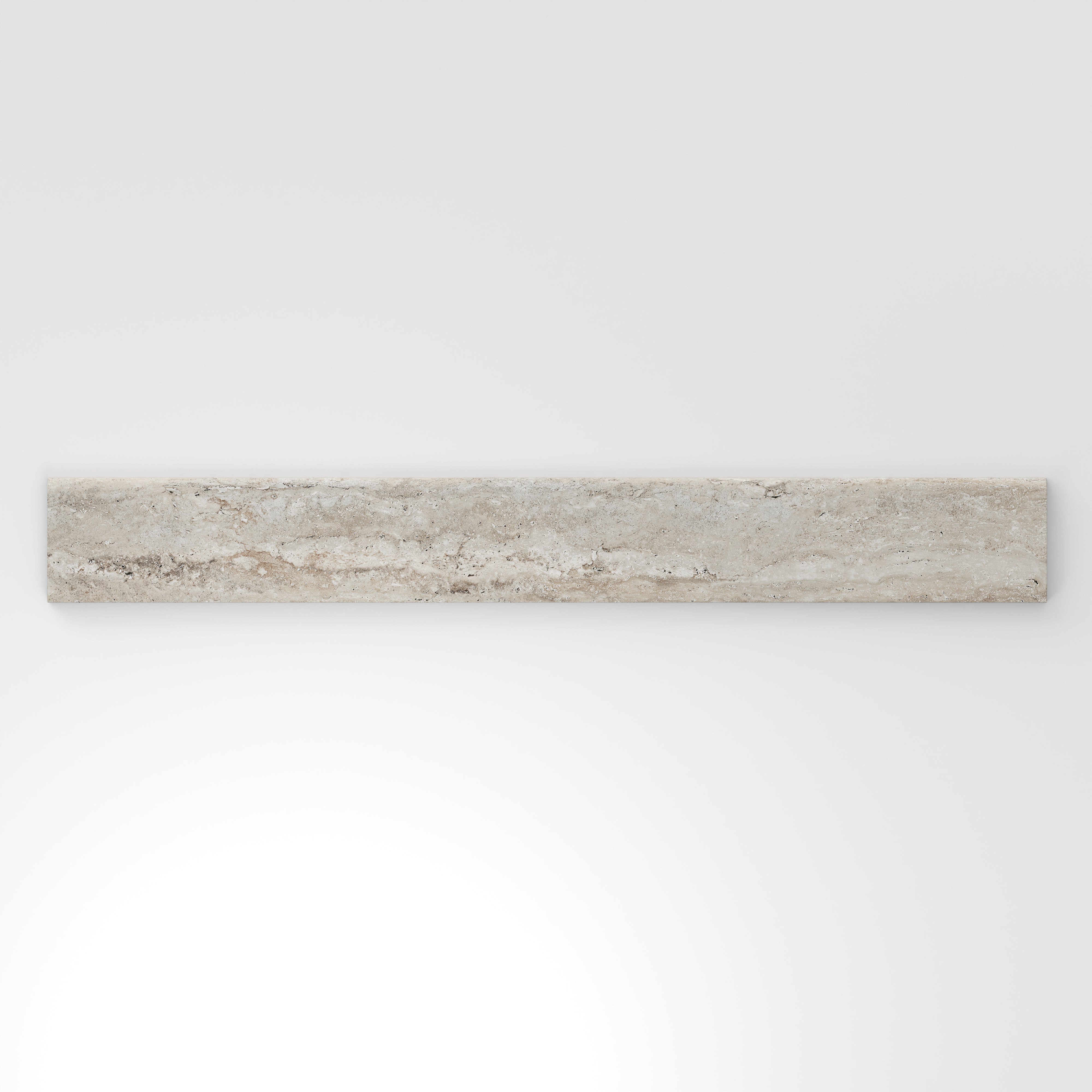 Warm beige travertine-look porcelain 3x24 matte bullnose tile with soft stone movement, gentle veining, and a finished edge.