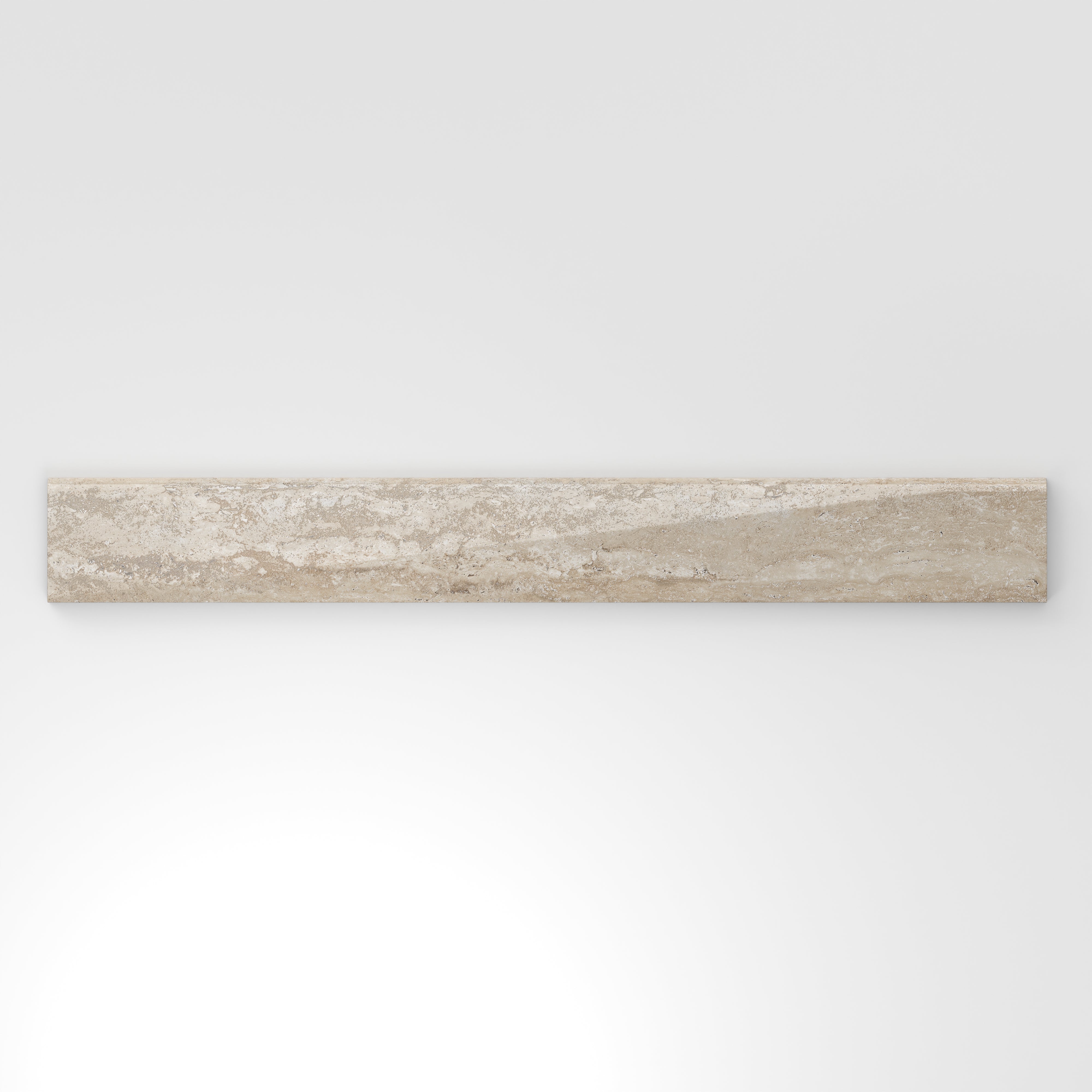 Neutral beige travertine-look porcelain 3x24 polished bullnose tile showcasing gentle stone variation and a smooth contoured edge.