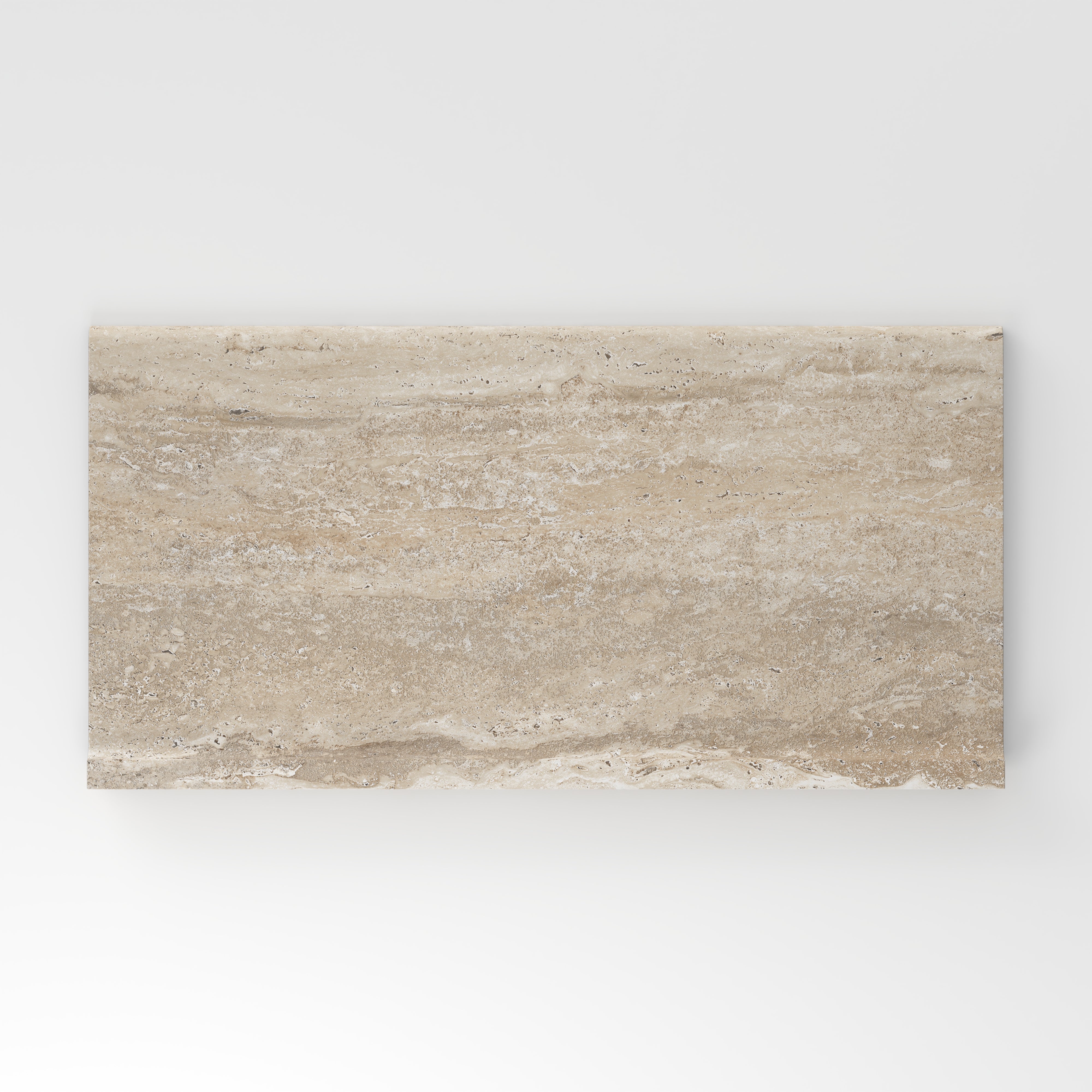 Beige travertine-look porcelain 6x12 cove base tile showcasing warm tones, gentle horizontal veining, and authentic stone character.