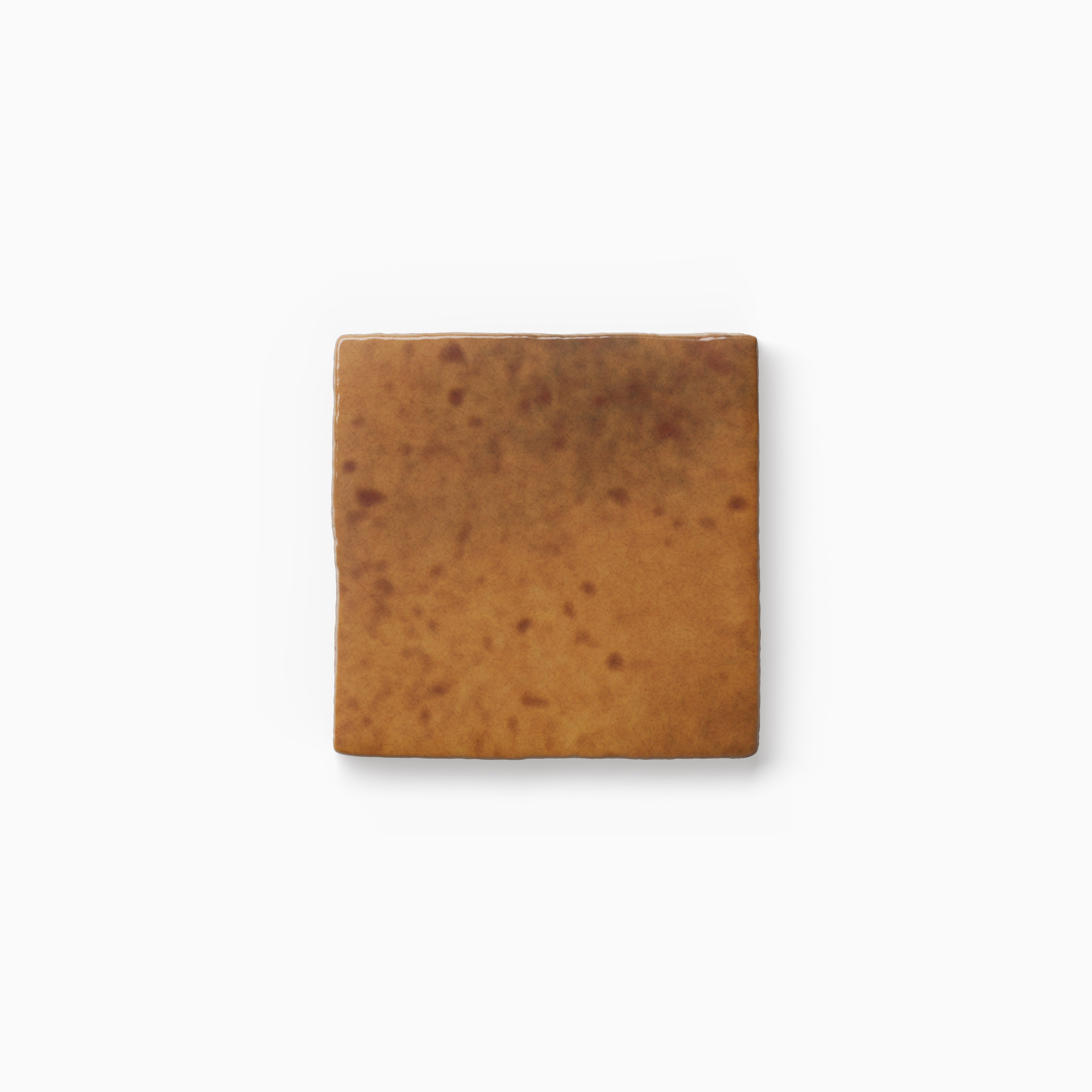 Warm brown tile sample with mottled surface variation, subtle speckling, and softly rounded edges displayed against a white background.