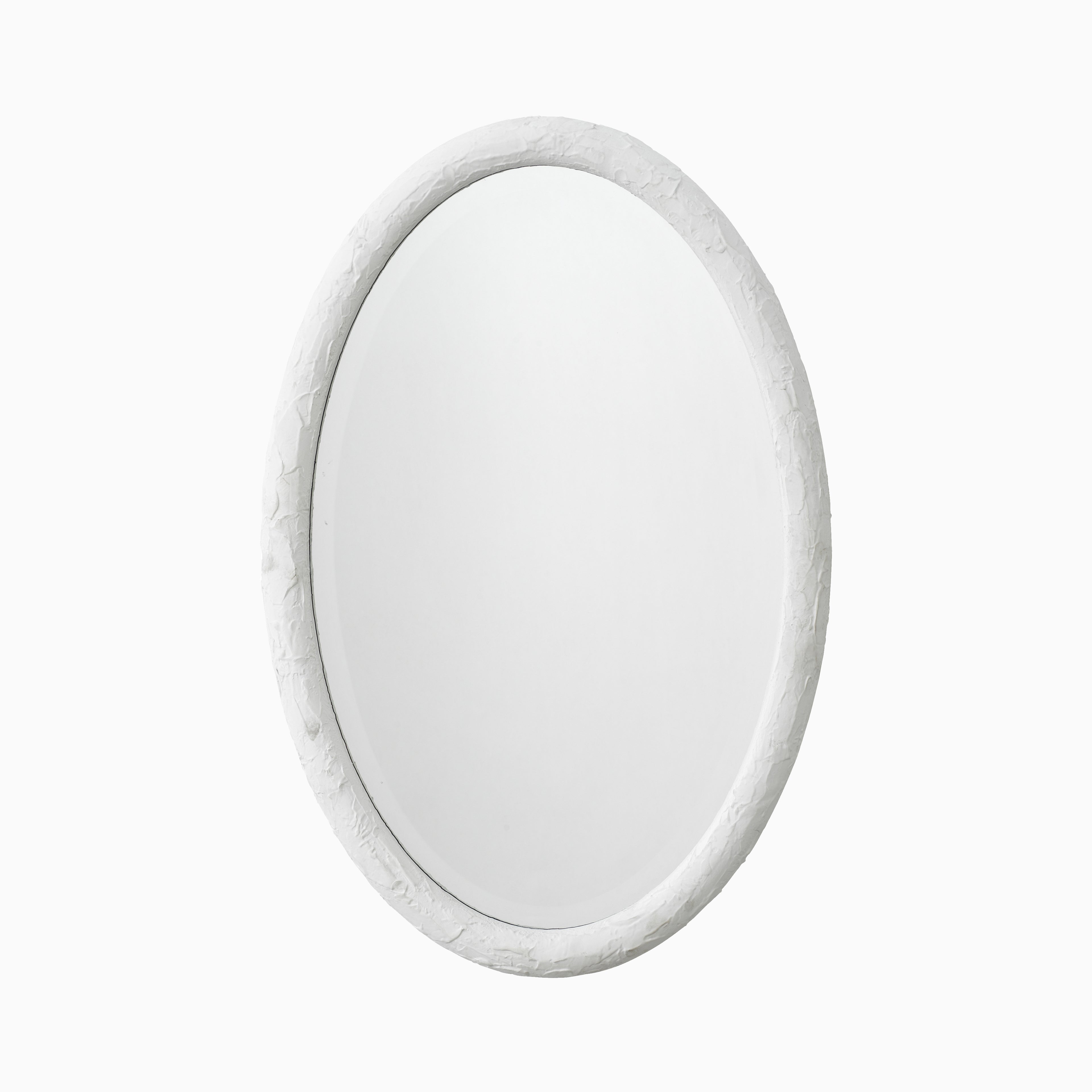 Oval wall mirror with a textured white resin frame, showcasing subtle markings and a refined sculptural finish for modern interiors.