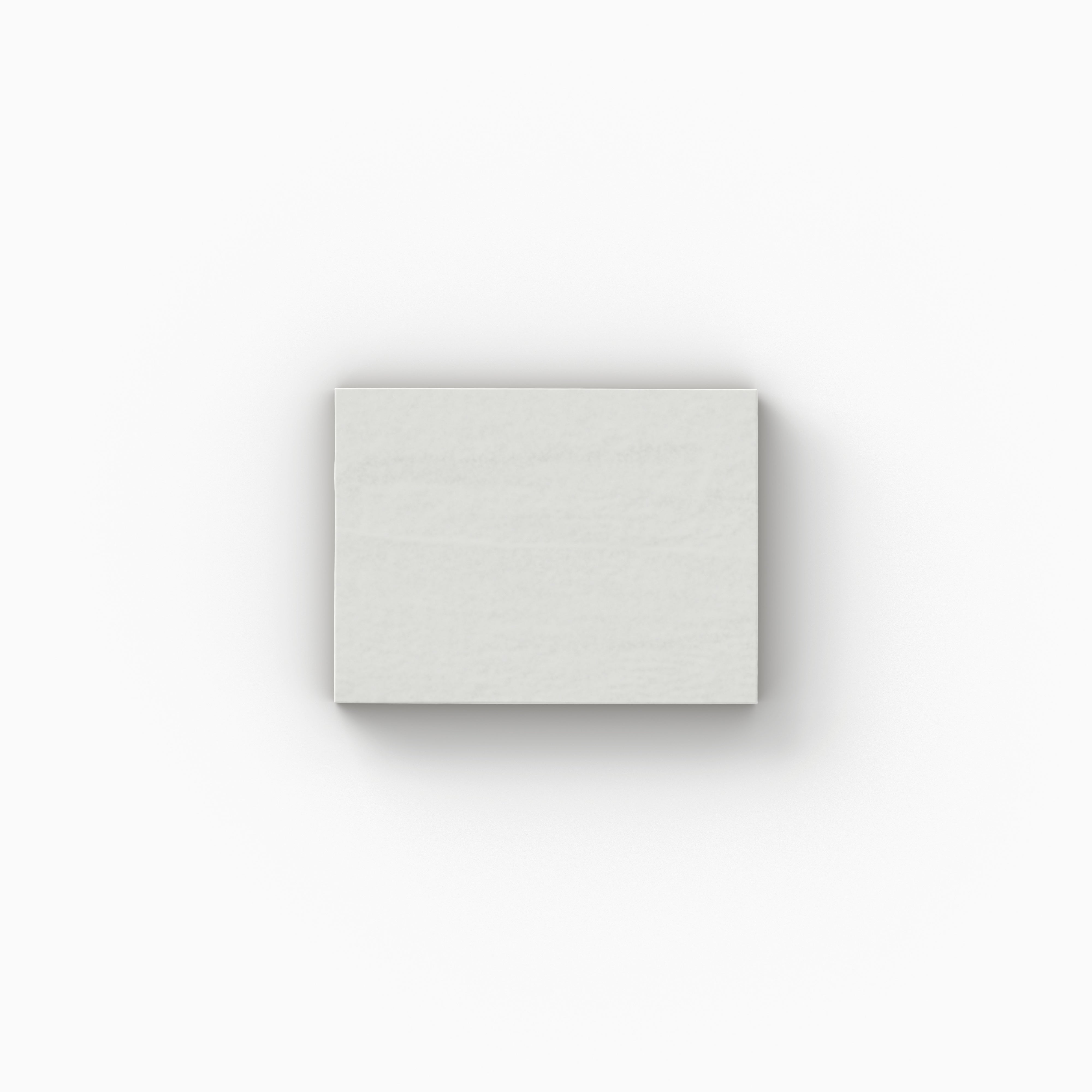 A white 3x4 porcelain tile sample with a glossy finish, showcasing gentle color movement and handcrafted character on a white backdrop.