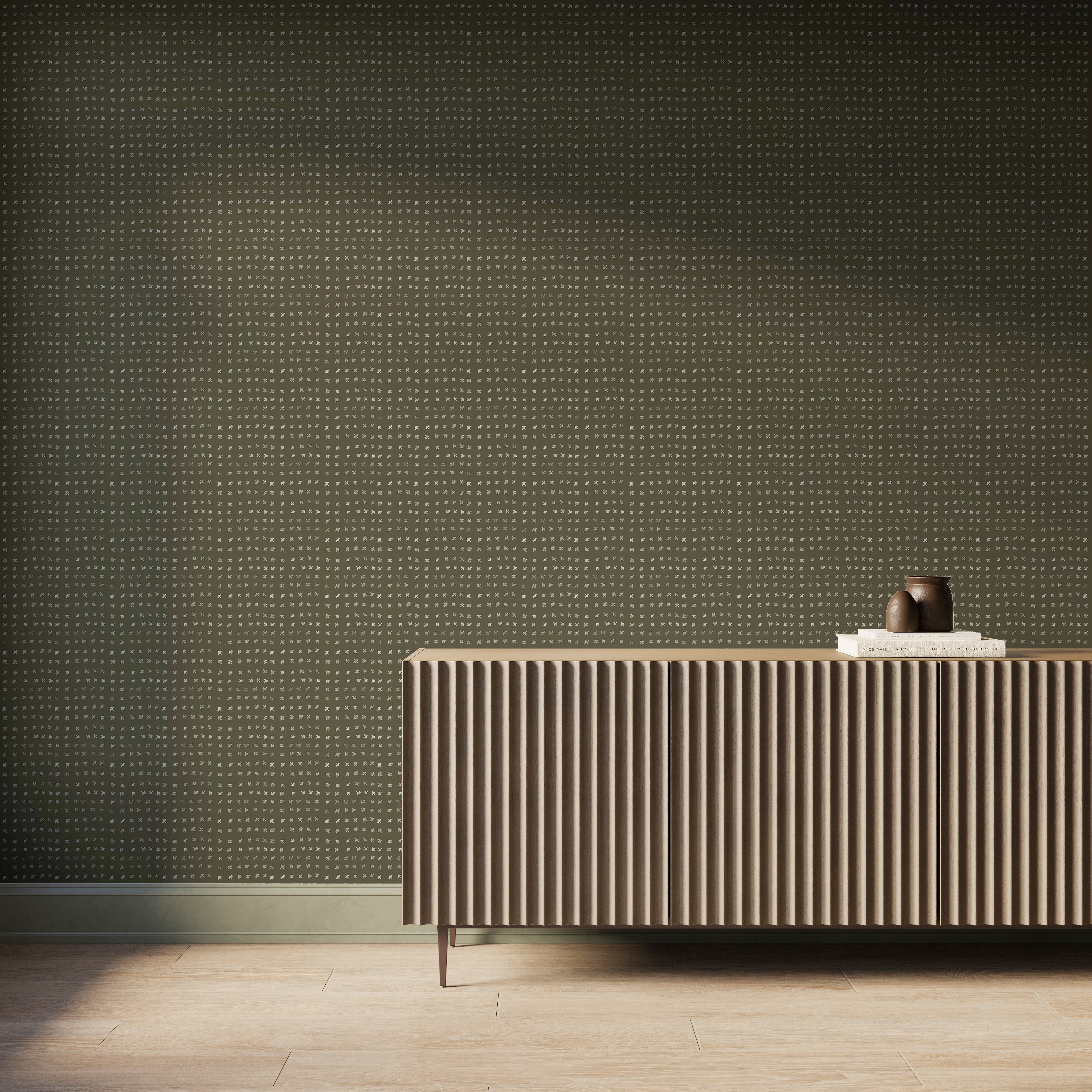 Dark green Somerset Wallpaper in Olive II with soft off-white watercolor-style motifs creates a relaxed backdrop behind a ribbed wood console.