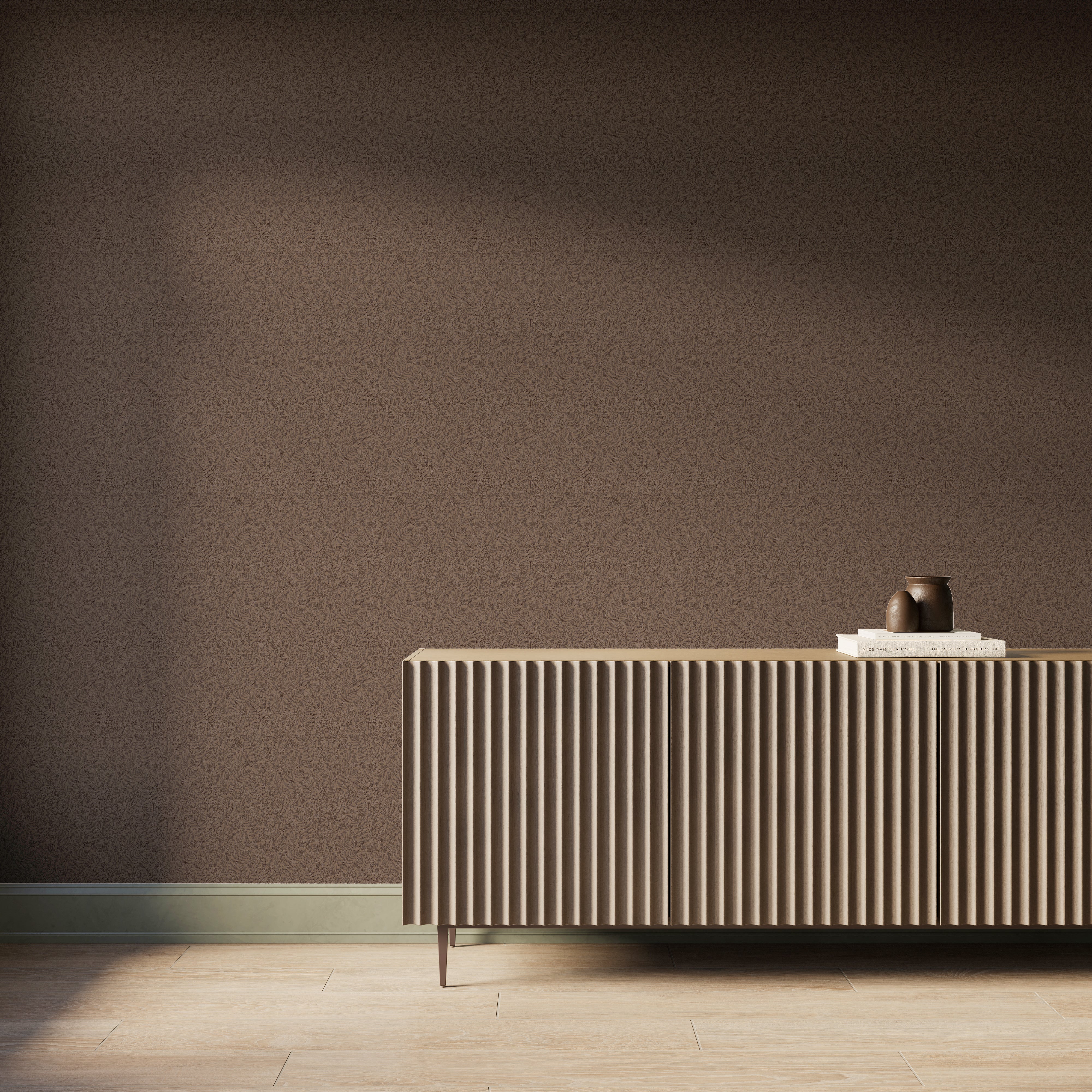 Modern interior featuring earthy brown botanical wallpaper with a subtle hand-sketched foliage pattern, paired with a fluted wood console cabinet, light wood flooring, and soft natural light casting gentle shadows across the wall.