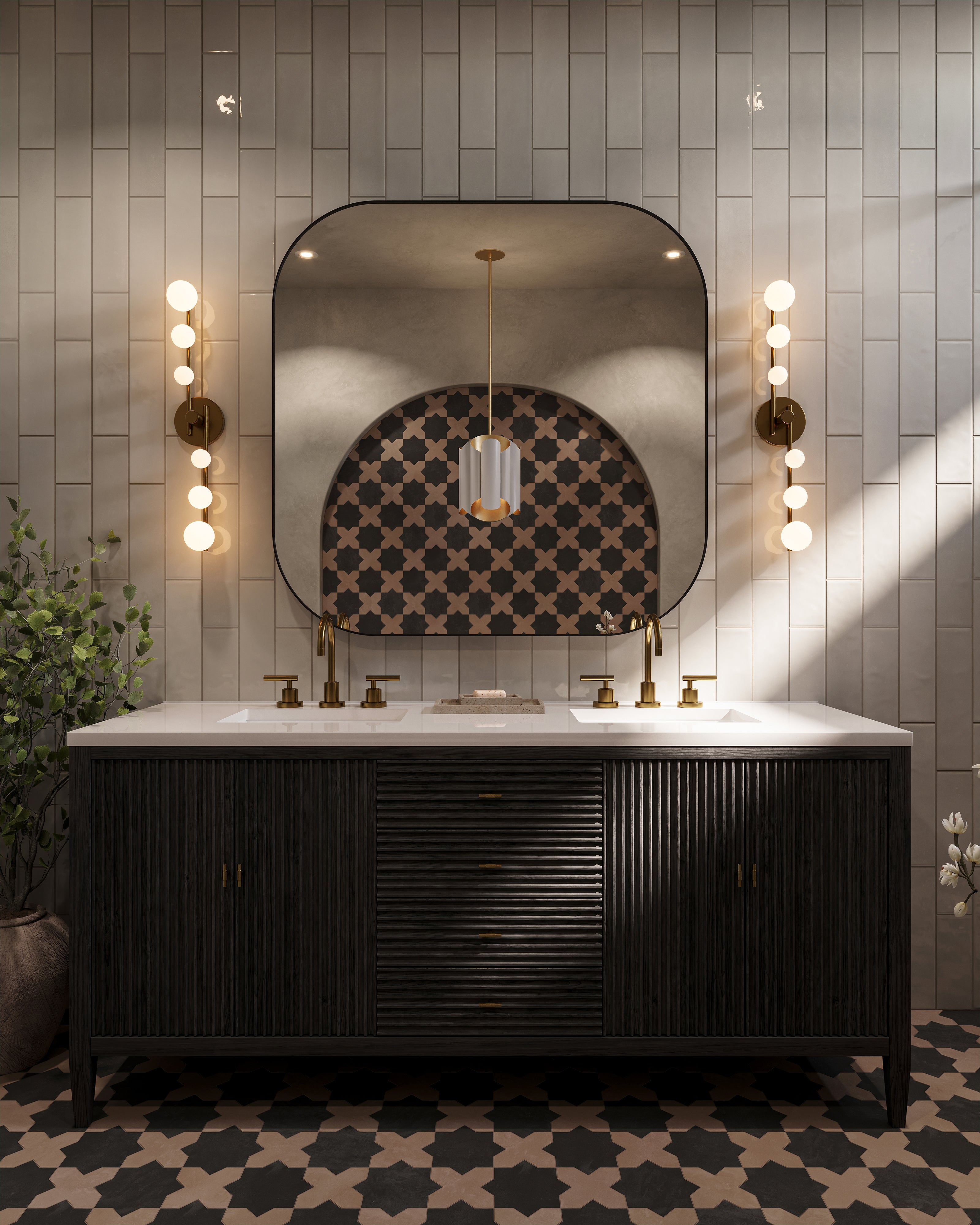 Dark wood double vanity with fluted cabinet fronts, brass fixtures, large mirror, and patterned tile floor in a moody bathroom.