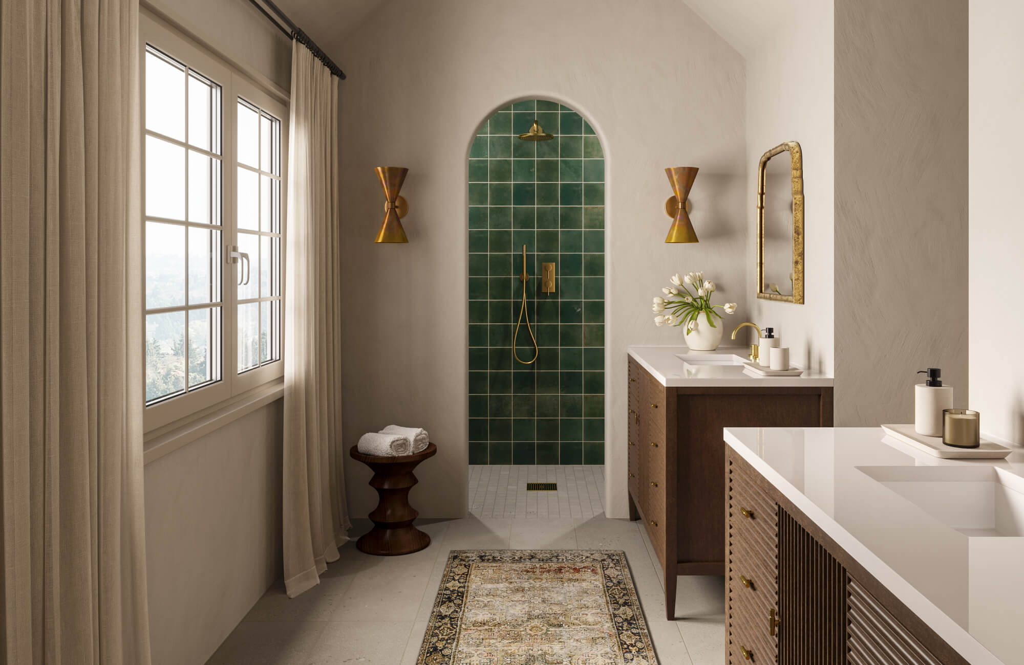 Elegant bathroom with an arched green-tiled shower, warm brass fixtures, and a vintage-style rug adding charm to the neutral-toned space.