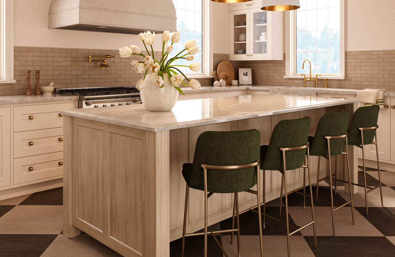 Bright, elegant kitchen showcasing a marble-topped island styled as a counter height dining table, paired with upholstered green stools, brass accents, and soft neutral cabinetry for a refined yet inviting look.