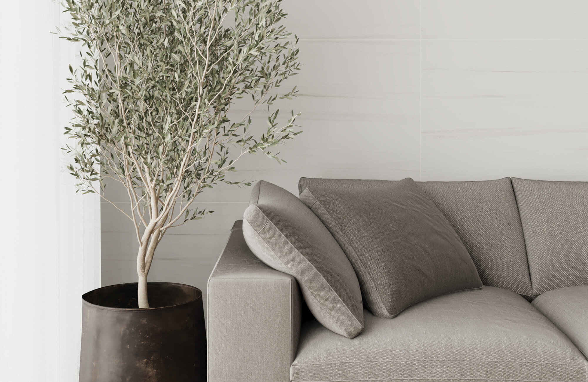 Outdoor sofa with plush cushions and supportive pillows, reflecting the comfort and support considerations when comparing feather pillows vs synthetic pillows.