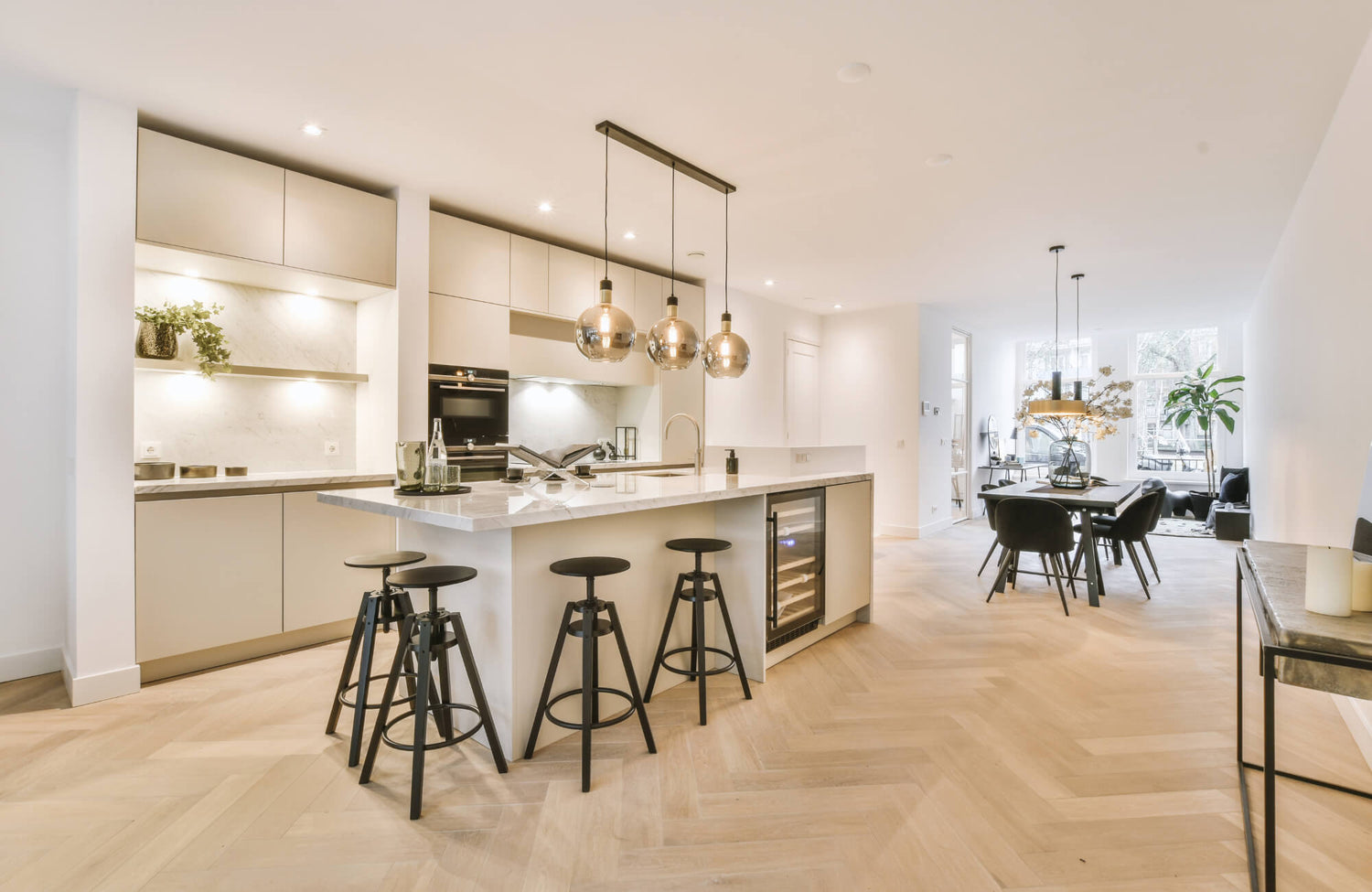 Open shelving and hidden storage in open kitchen