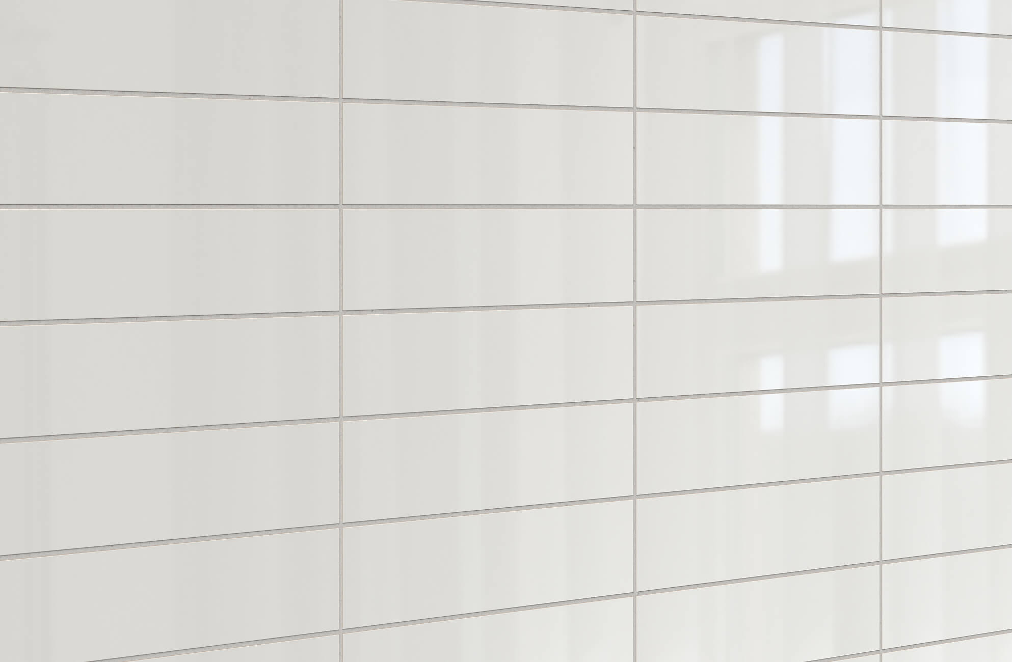 Glossy white rectangular tiles arranged in a clean grid pattern, reflecting natural light for a sleek, modern finish.