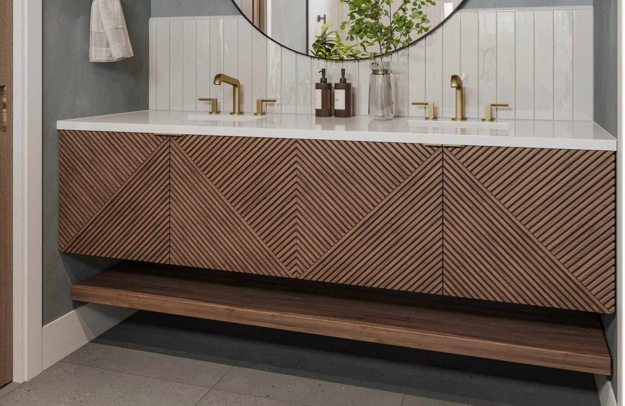 Floating wood bathroom vanity with geometric paneling, white quartz countertop, and gold faucets set against vertical ceramic wall tile