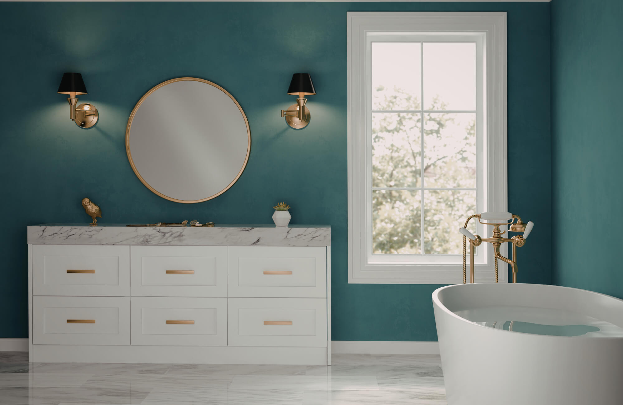Bathroom with teal walls, brass vanity lights, round mirror, white marble vanity, and freestanding tub.