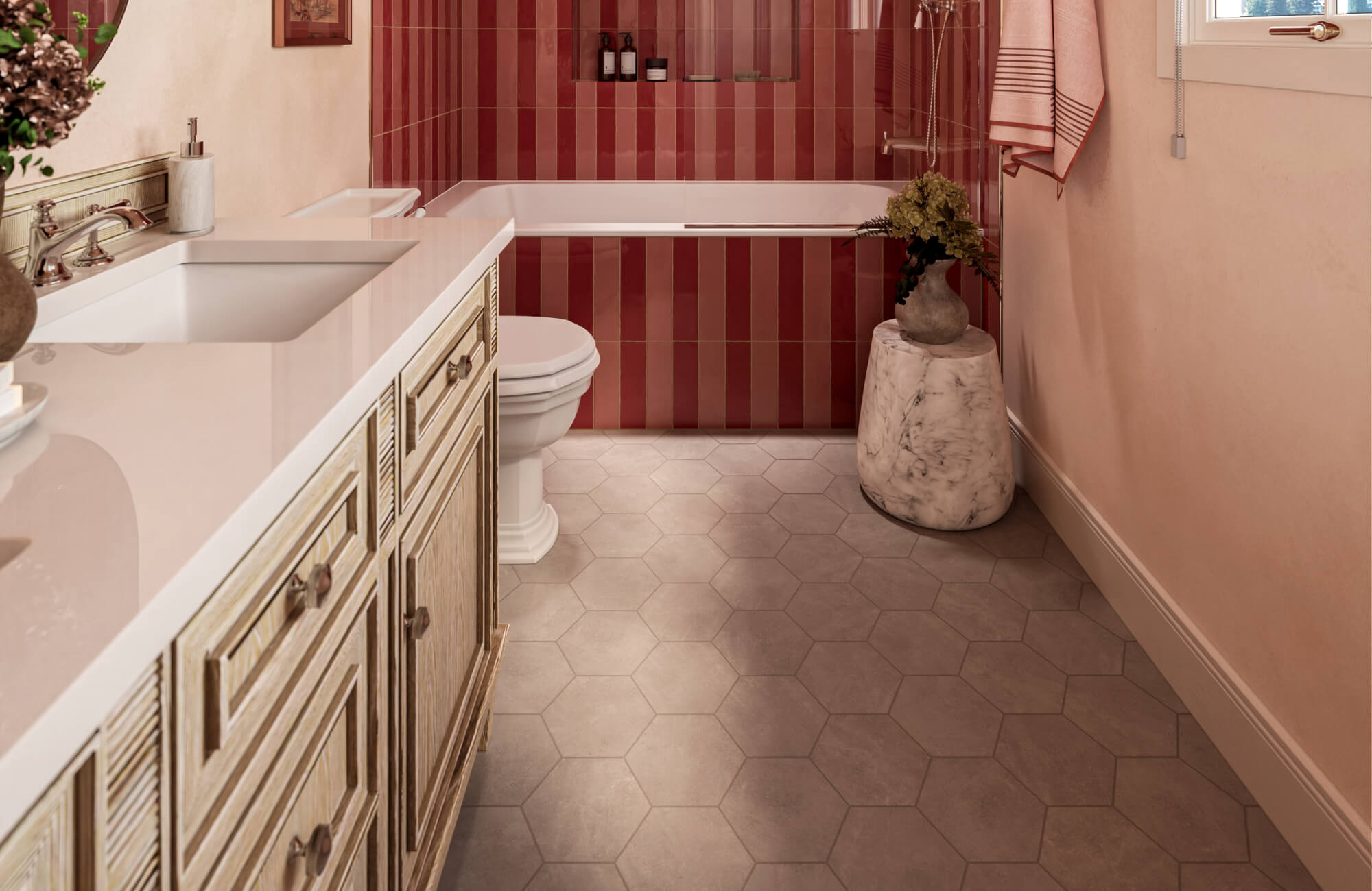 Hexagon bathroom floor tile laid in a soft neutral tone, creating a clean walkway between the vanity and bathtub in a minimalist bathroom layout.