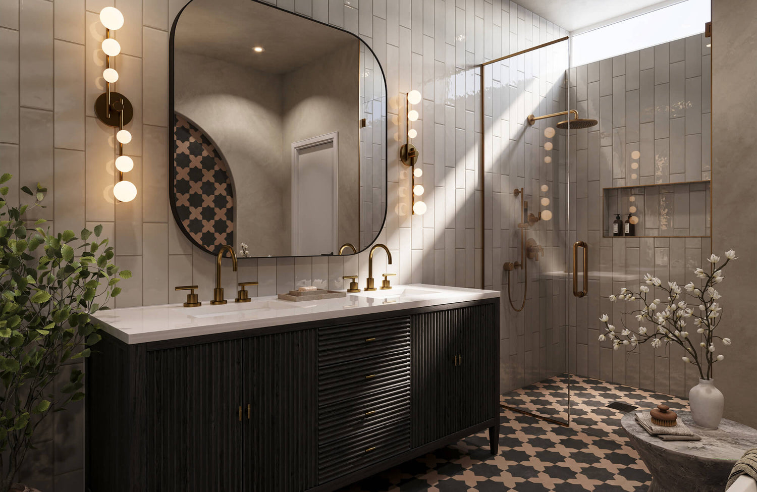 Modern bathroom with vertical sconces beside a large rounded mirror, double vanity, and brass fixtures.
