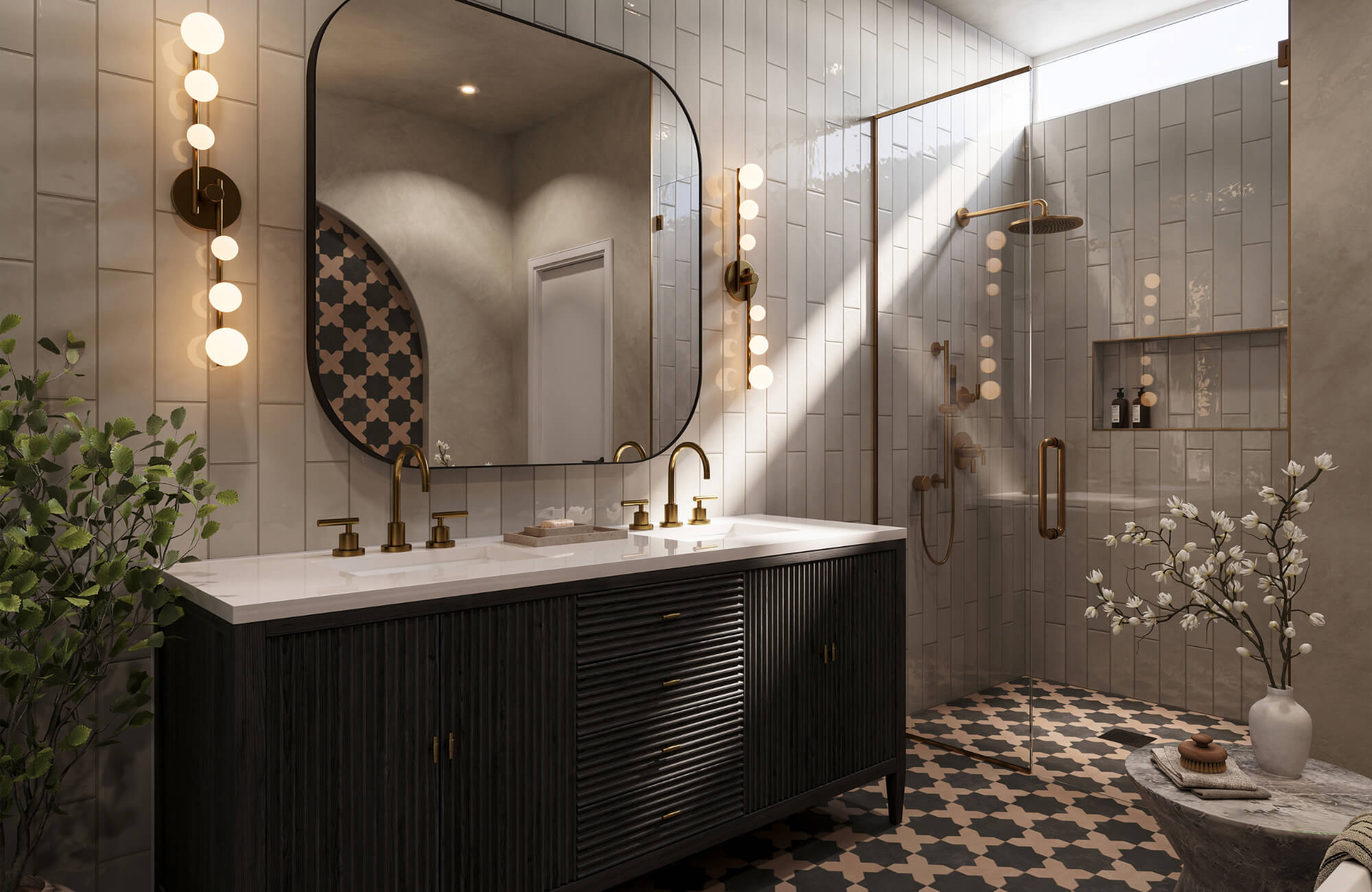 Modern bathroom with vertical sconces beside a large rounded mirror, double vanity, and brass fixtures.