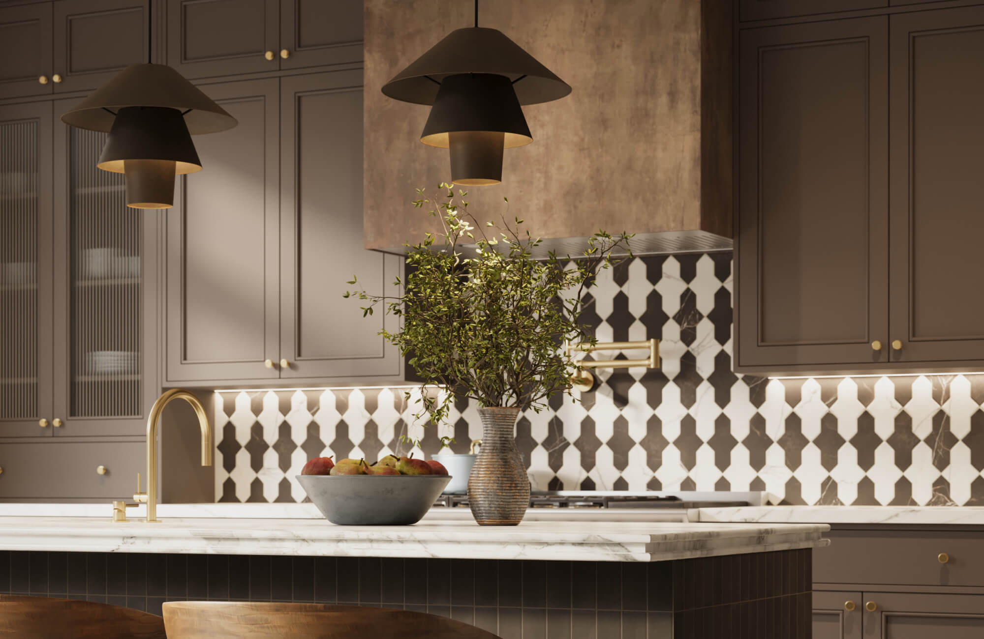 Contemporary kitchen featuring pendant lights centered above a marble island, with soft gray cabinetry, brass fixtures, and a graphic tile backsplash adding visual contrast.