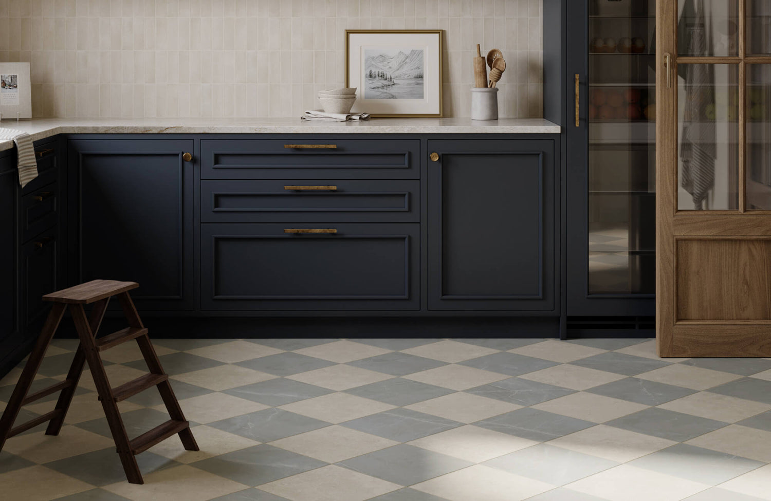 Classic checkerboard floor tiles in soft gray and cream bring timeless elegance to this navy and wood-accented kitchen.