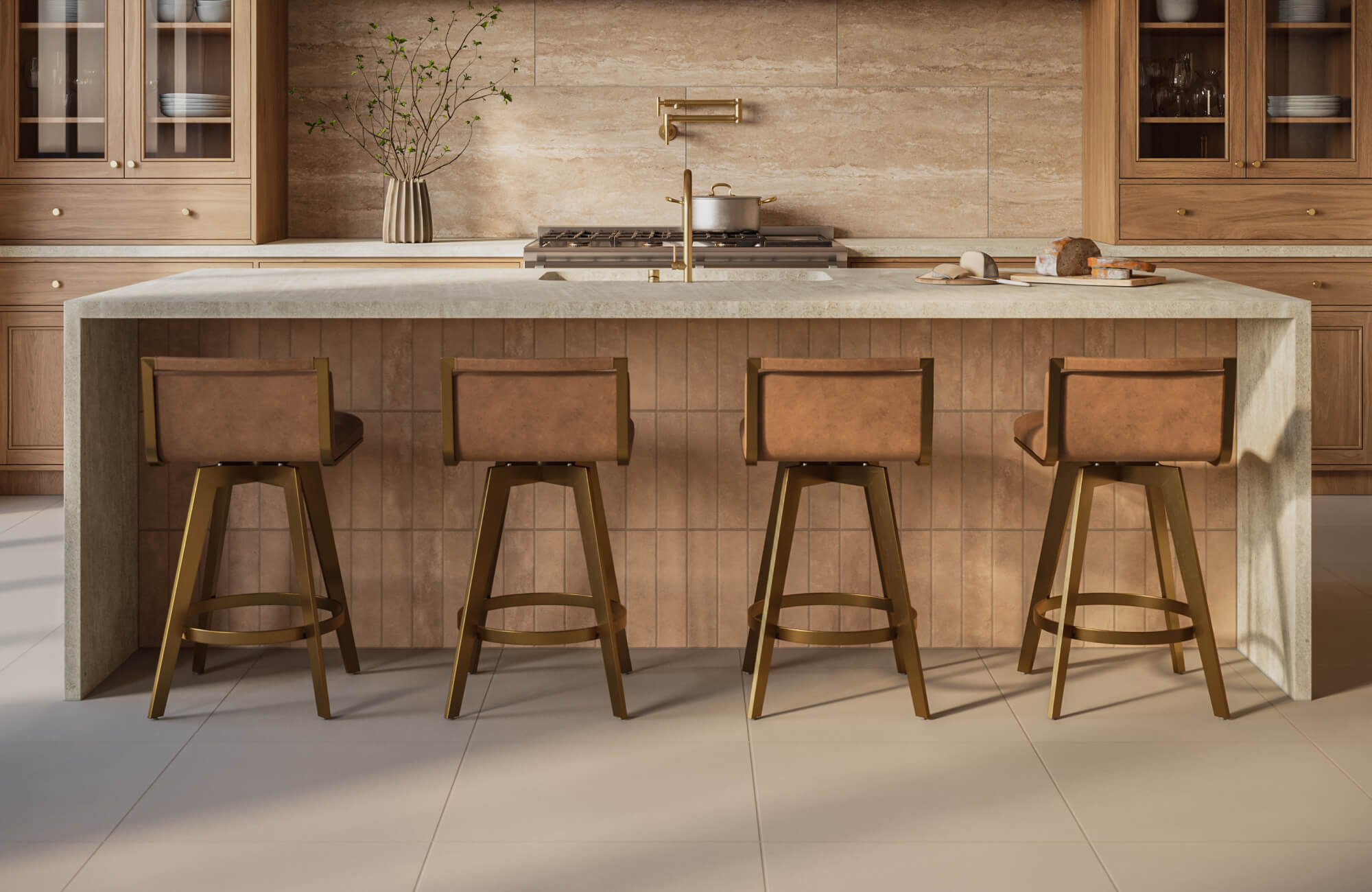 Kitchen island with four evenly spaced stools, showing balanced seating along a wide countertop.