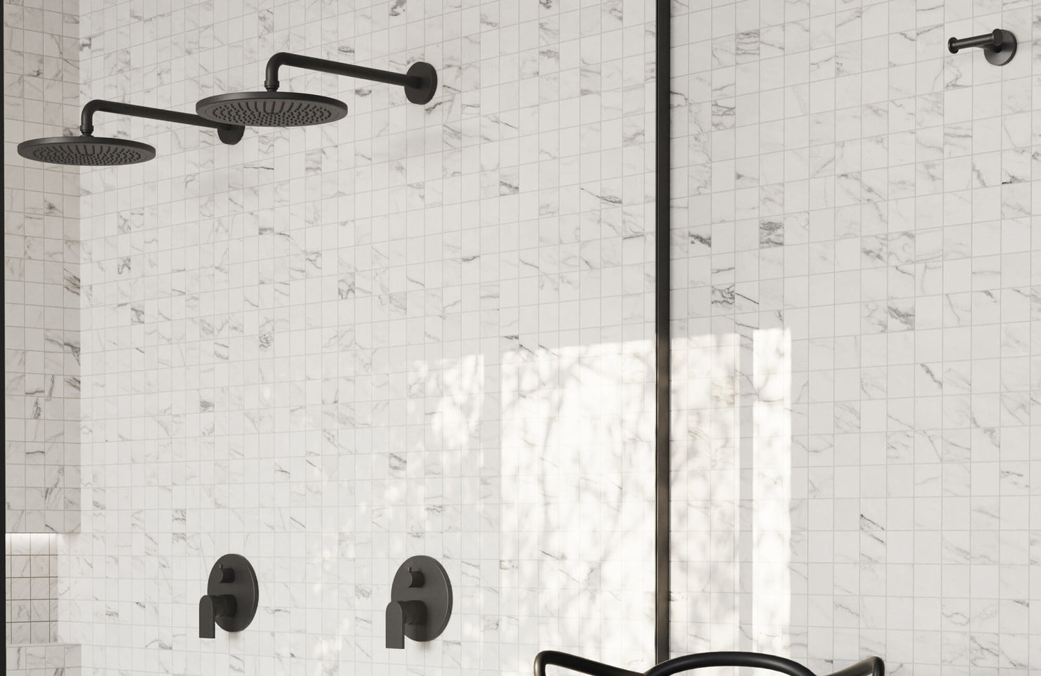 Marble look mosaic shower wall with dual black fixtures, offering a clean, water-resistant surface ideal for modern bathrooms.