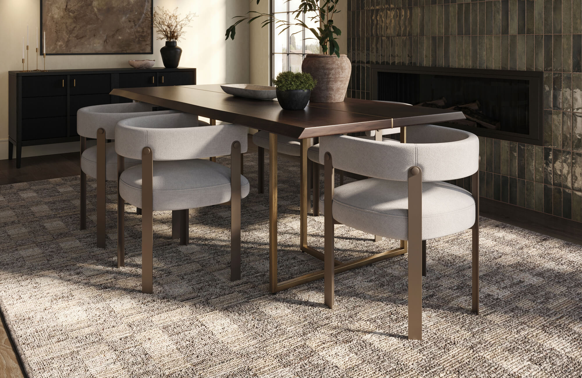 Modern dining room with a dark wood table, brass legs, sculptural upholstered chairs, textured area rug, and tiled fireplace wall.
