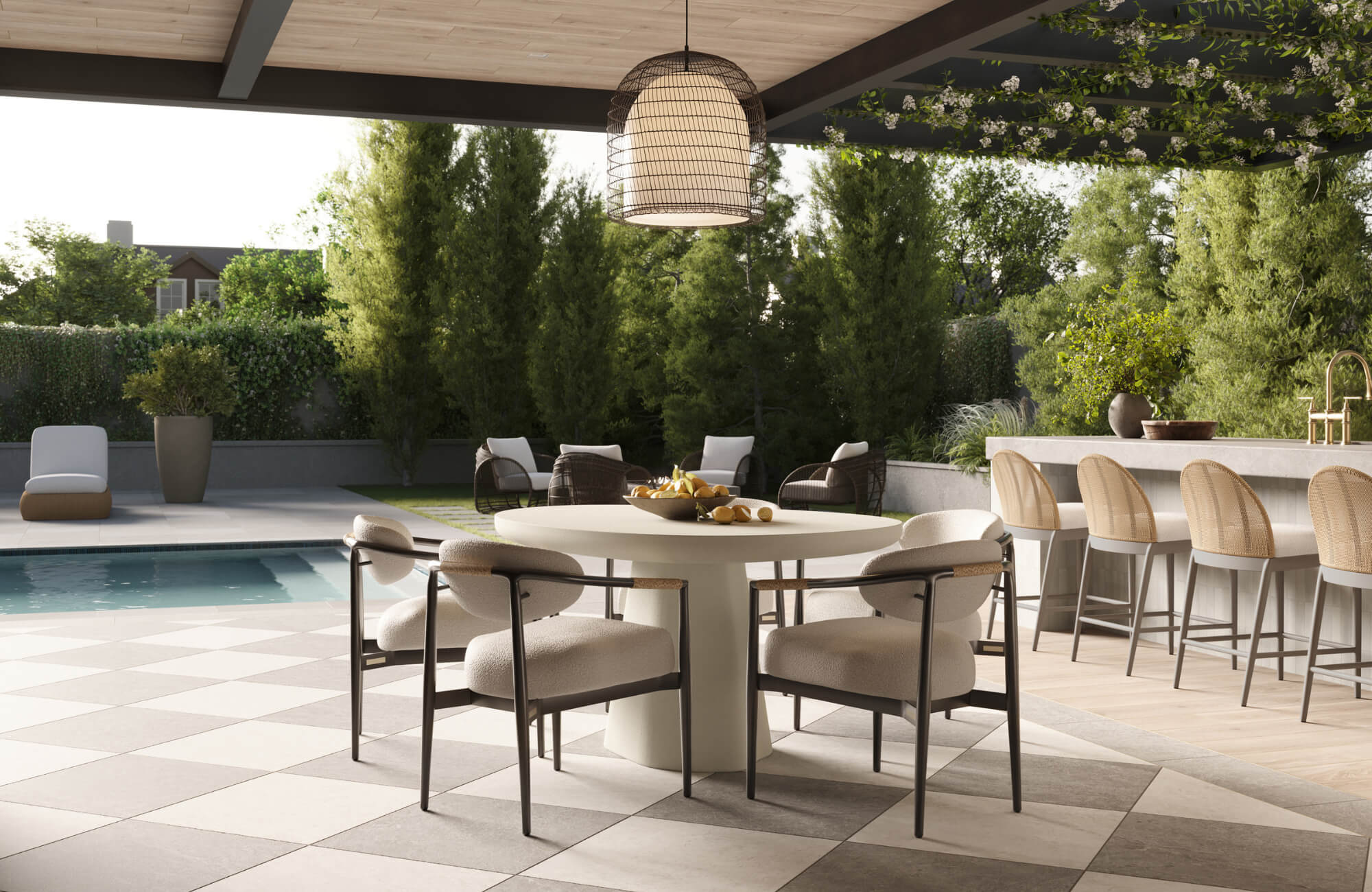Elegant alfresco dining area with round table, cushioned chairs, pendant lighting, and poolside lounge under a modern pergola.