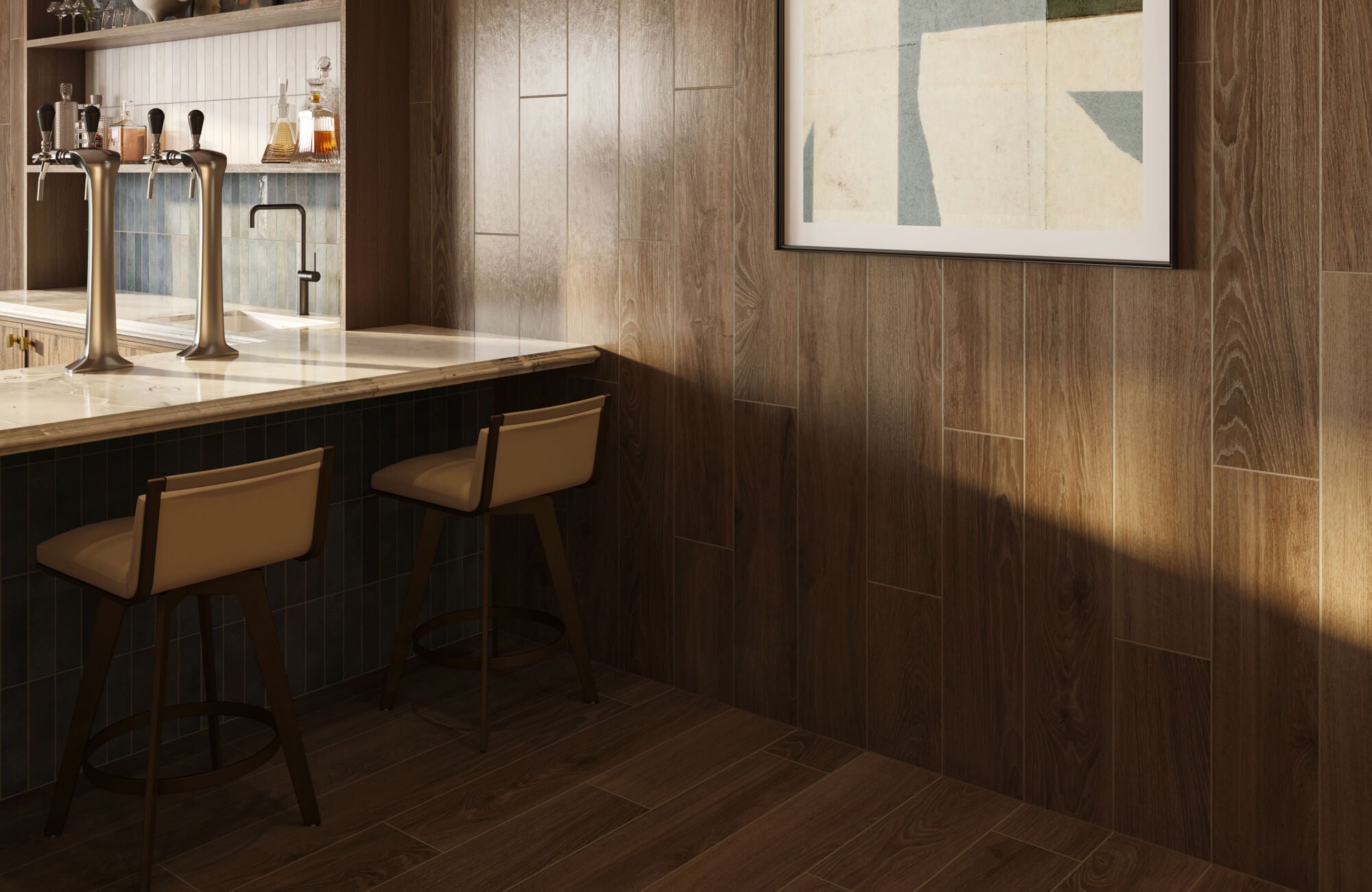 A warm home bar with wood-look tile walls and flooring, a marble counter, blue tile accents, and modern bar stools set beneath soft natural light.