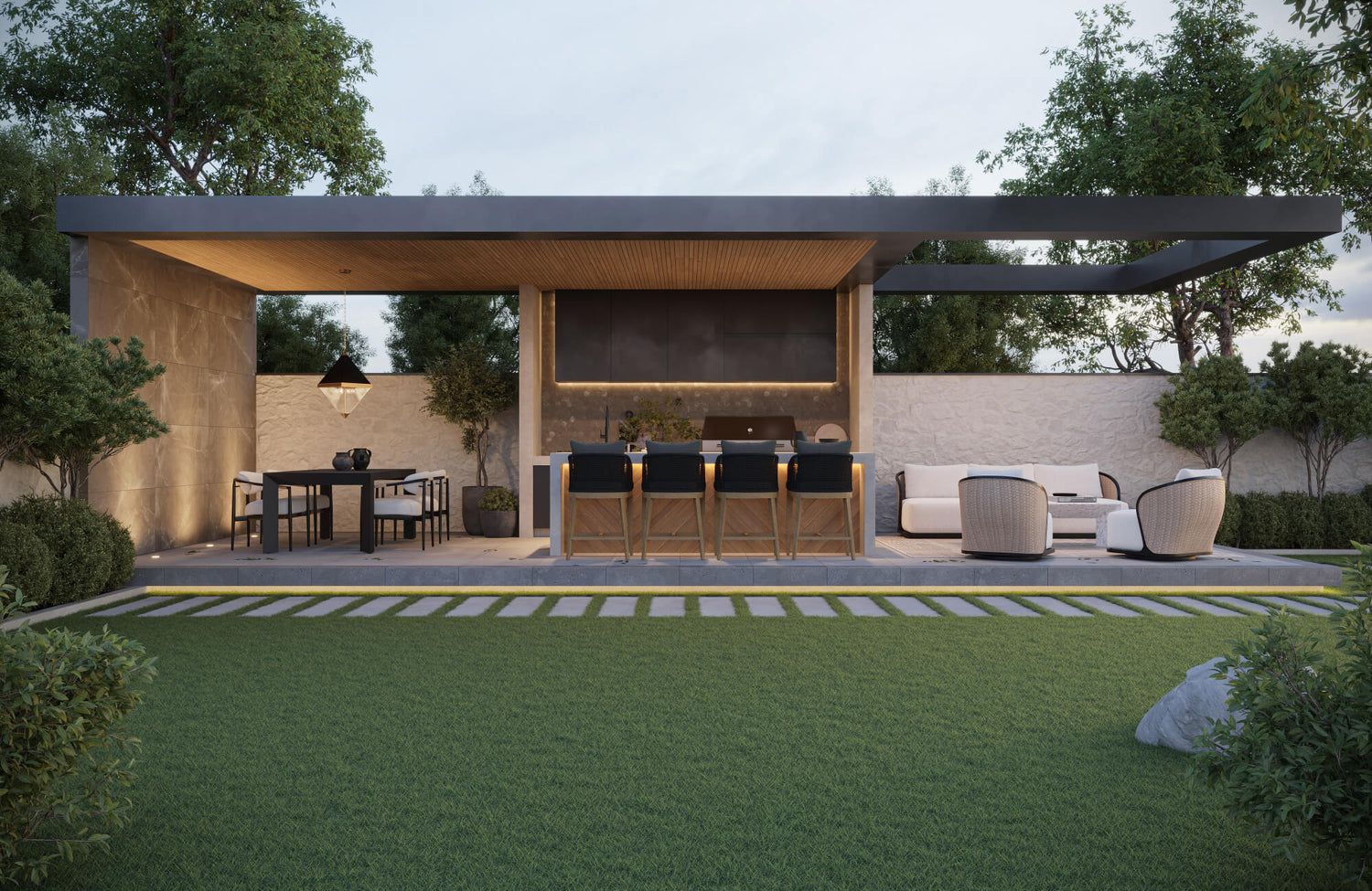 Modern outdoor pavilion with covered kitchen, bar seating, dining area, and lounge furniture overlooking manicured lawn.