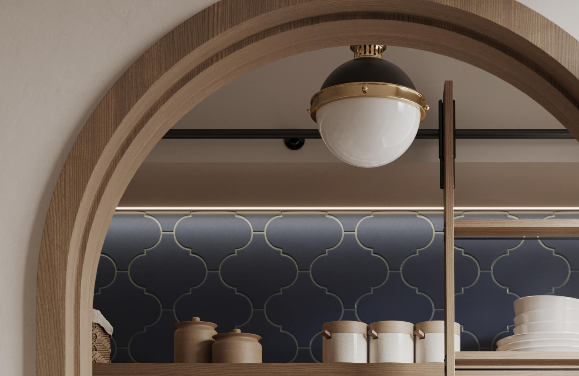 Elegant kitchen nook with a bold navy arabesque tile backsplash, complemented by a globe flush mount lighting fixture in black and brass for a refined modern touch.