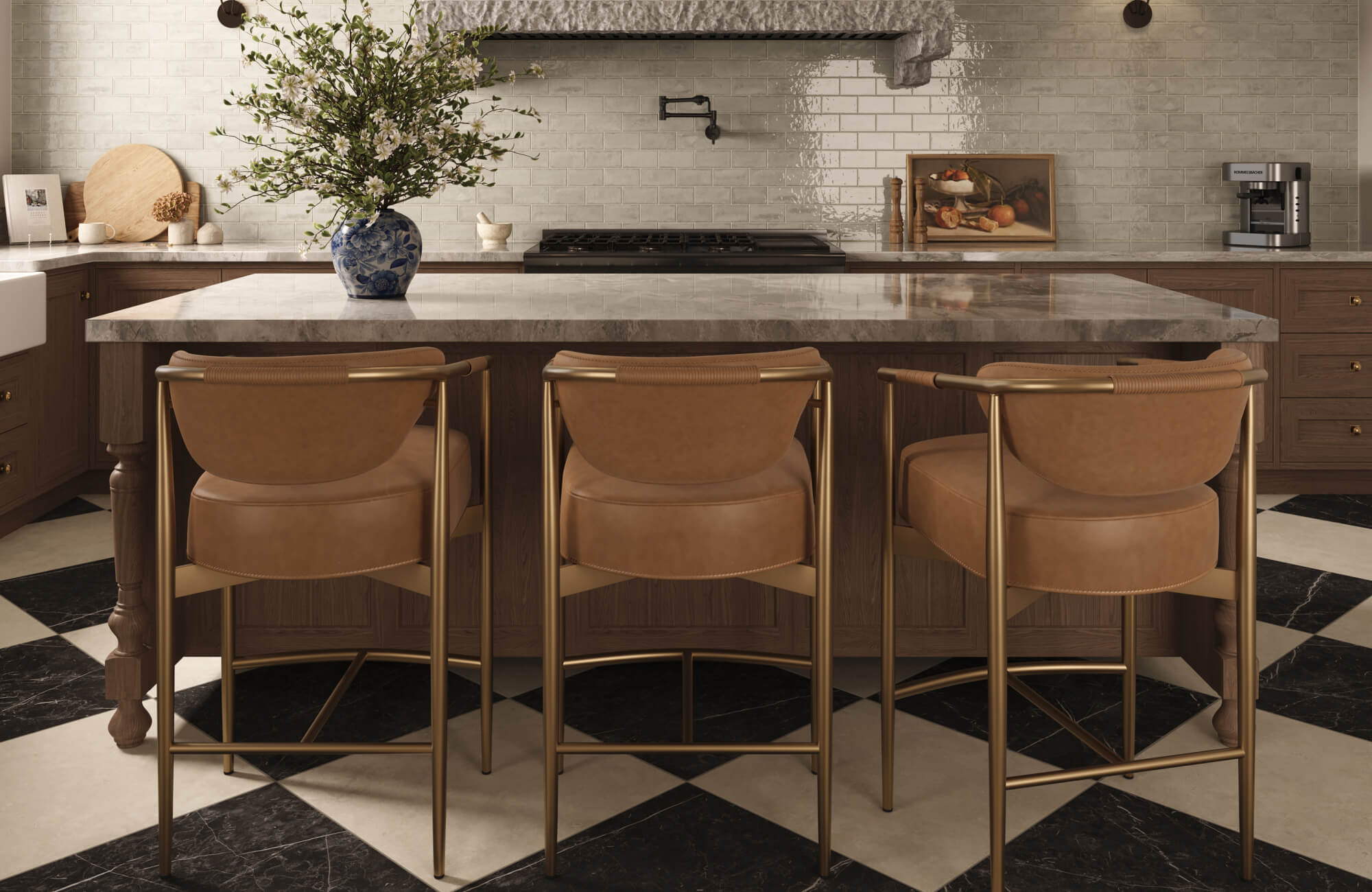 Kitchen island with three tan leather counter stools featuring brass frames, paired with a marble countertop and checkered black-and-white tile flooring.