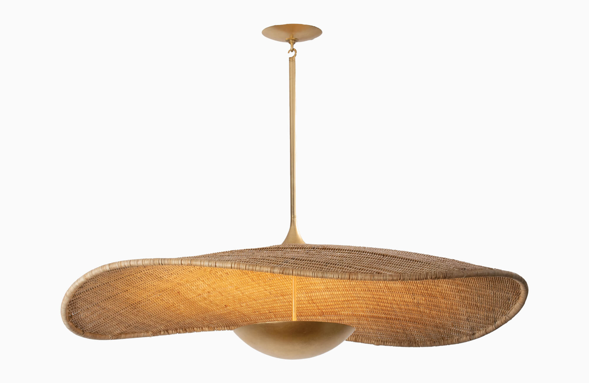 Sculptural rattan pendant light with a wave-like woven shade and warm brass accents for organic modern ambiance.