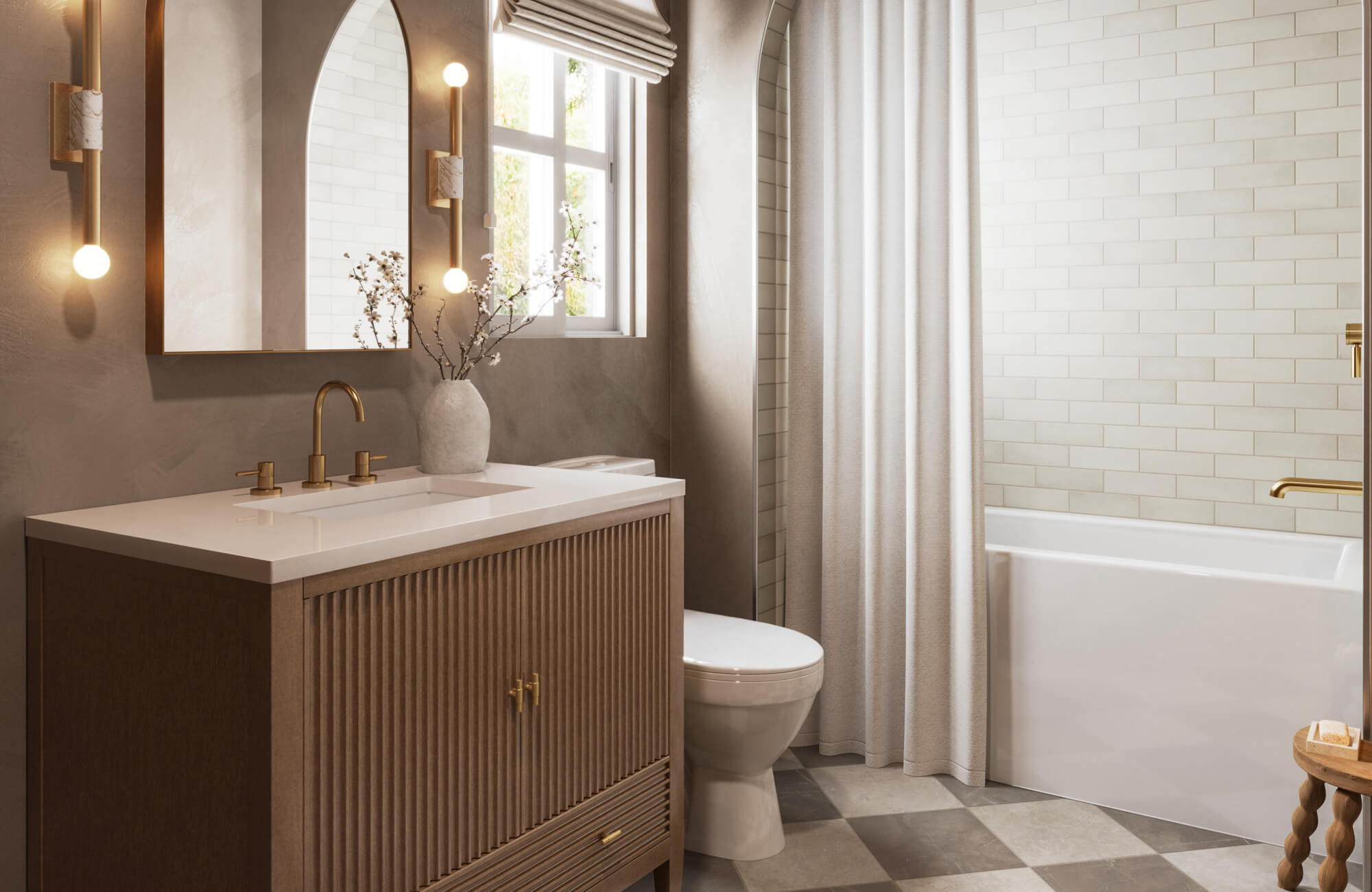 Elegant bathroom with creamy subway tile shower wall, gold fixtures, and a warm wood vanity topped with a white countertop.
