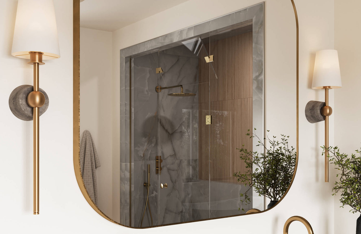 Modern bathroom with a large mirror reflecting a marble-tiled shower and gold fixtures, framed by sleek wall sconces.