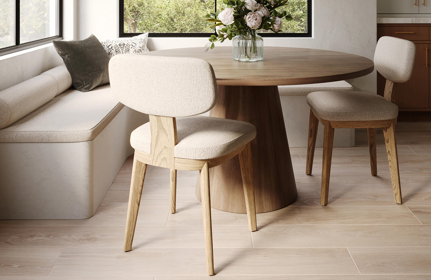 Cozy dining nook featuring warm wood look tile that captures natural wood grain textures, adding an inviting and elegant touch to the contemporary space.