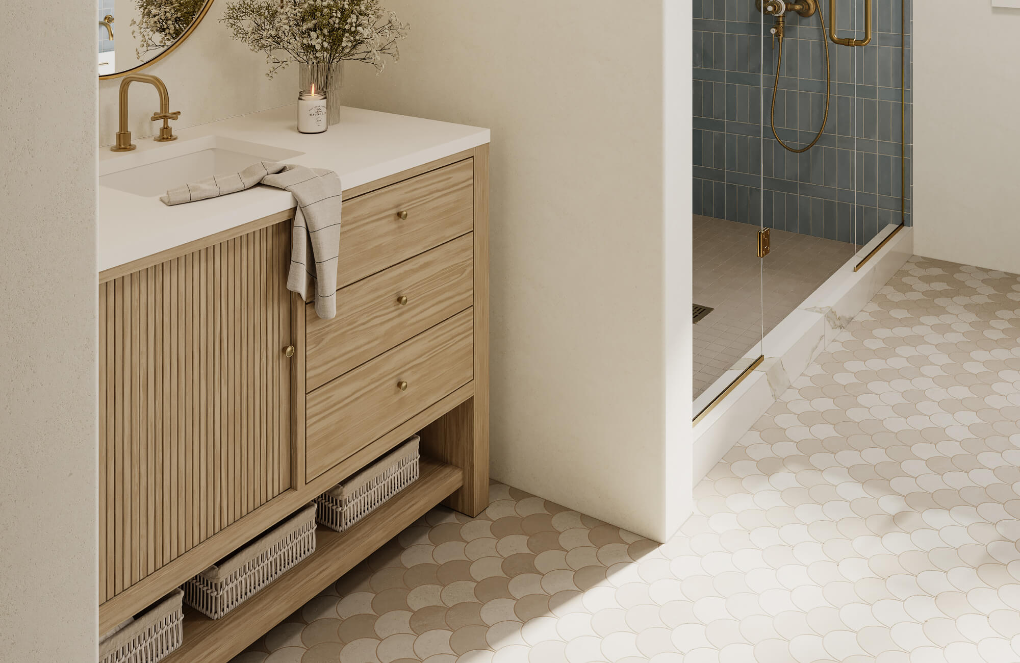 Modern bathroom featuring a fluted wood vanity, white countertop, and rounded mosaic floor tile that softens the space and guides movement toward the shower.