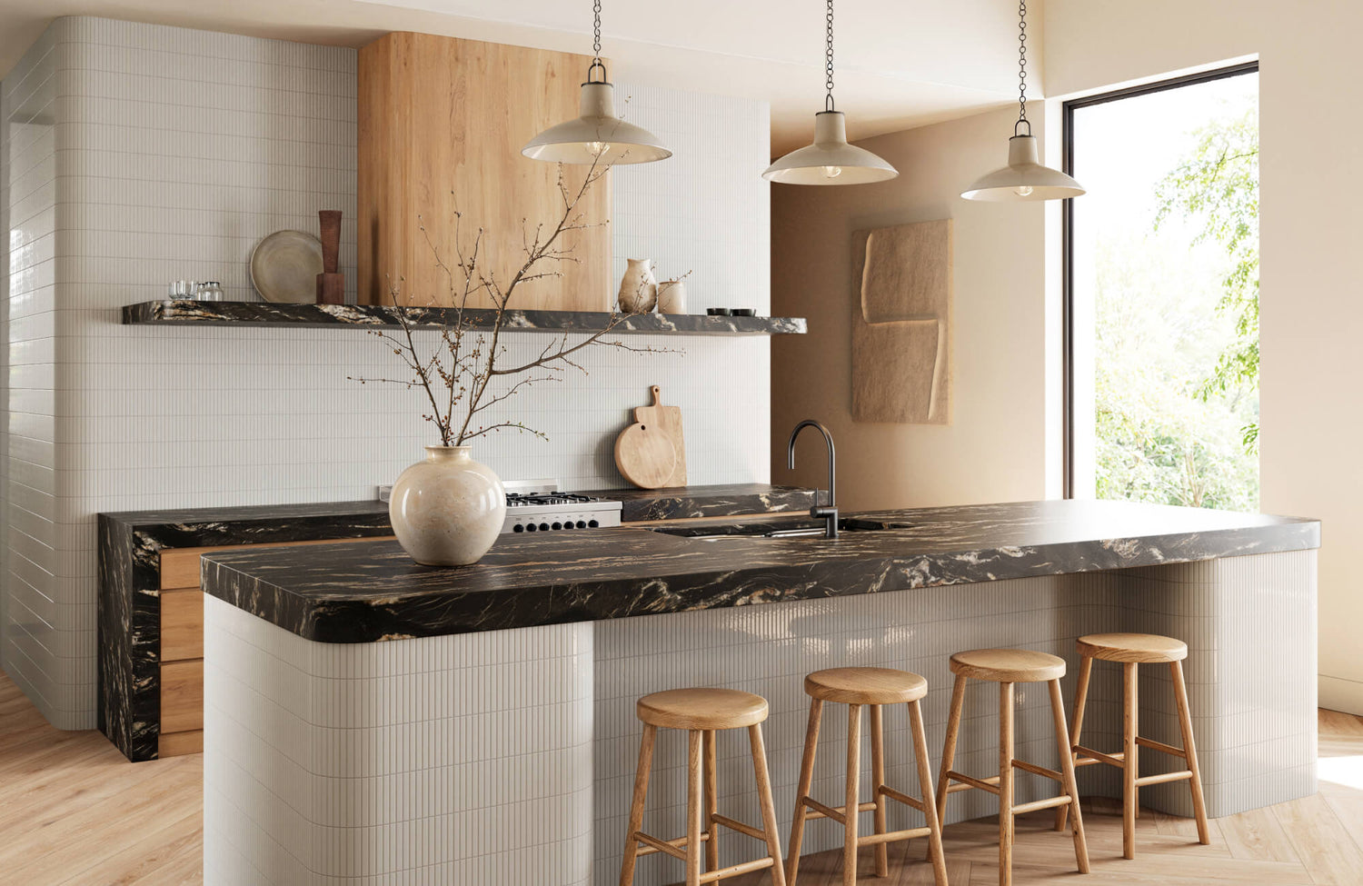 Modern kitchen with fluted white tile, black marble counters, and a trio of pendant lights in matte ivory.