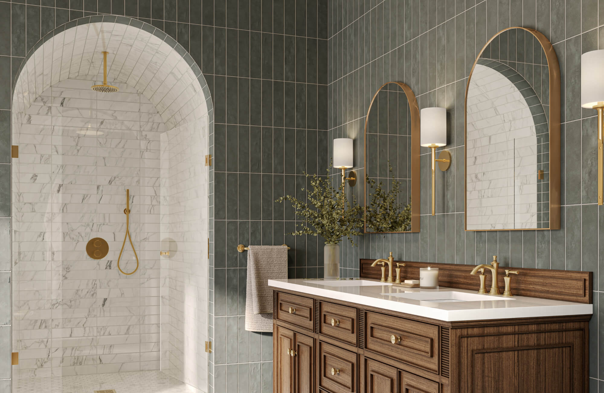 Elegant bathroom featuring vertically stacked deep green subway tiles, arched mirrors, warm brass fixtures, and a marble look subway tile shower framed by a curved entryway. 