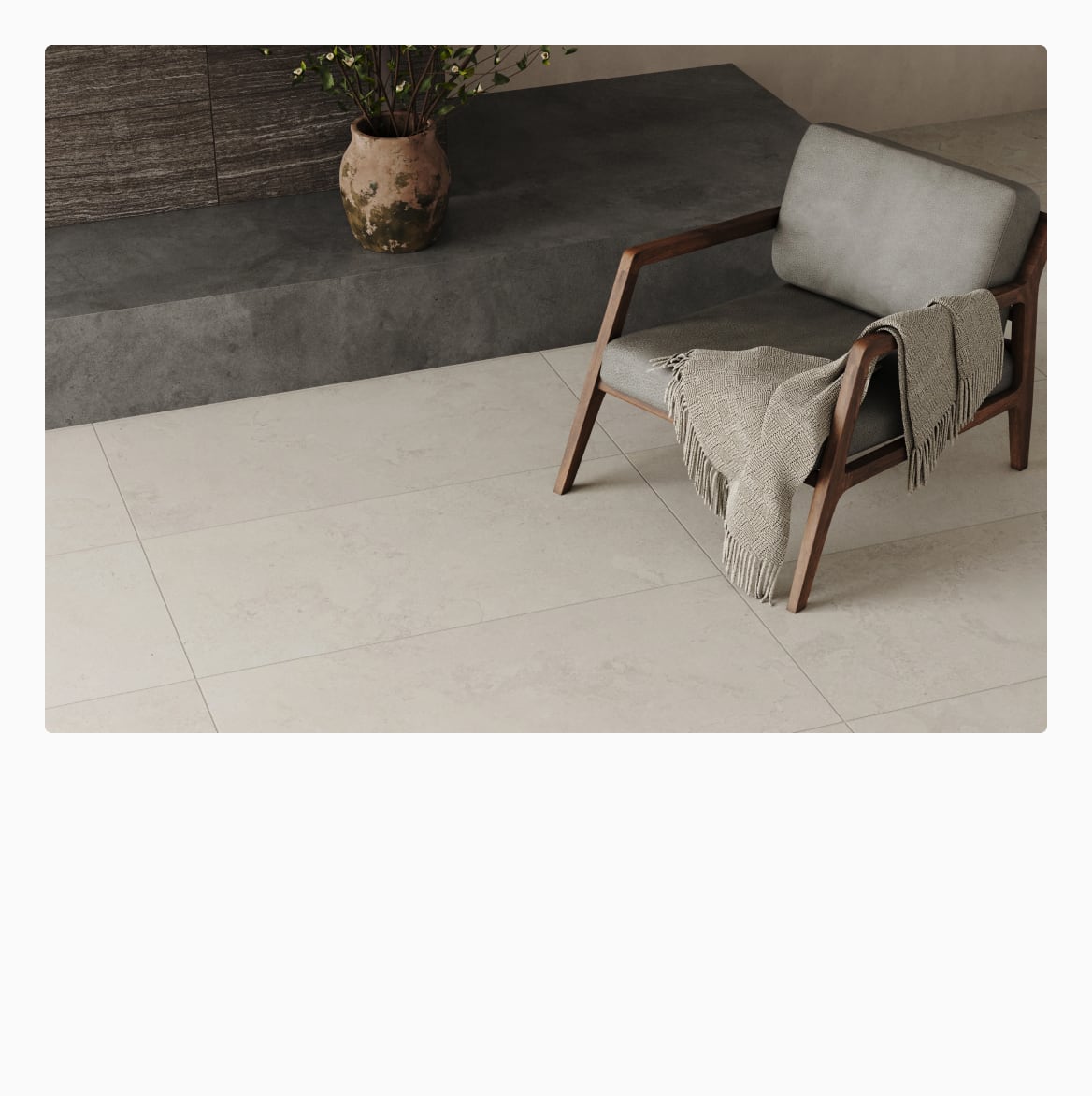 Smooth, light-hued floor tiles grace this minimalist room, offering a serene and spacious ambiance.
