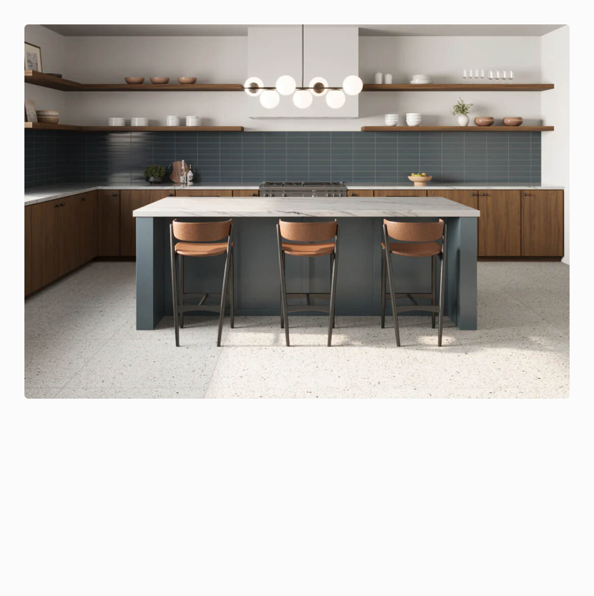 Sleek kitchen with deep blue subway tile backsplash and speckled terrazzo flooring