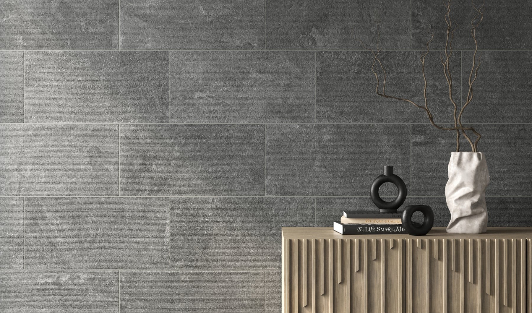 Textured dark grey tile provides a sophisticated backdrop, enhancing the sleek decor on a minimalist wooden console