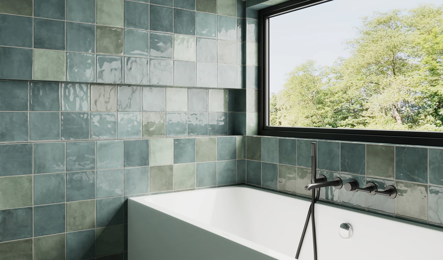 Handcrafted green tile with a unique watercolor finish surrounds a serene bath, echoing the verdant outdoors