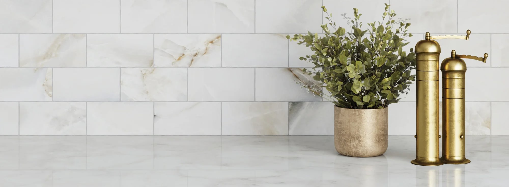 Elegant onyx look tile with subtle veining adds a touch of luxury to a sophisticated and airy interior