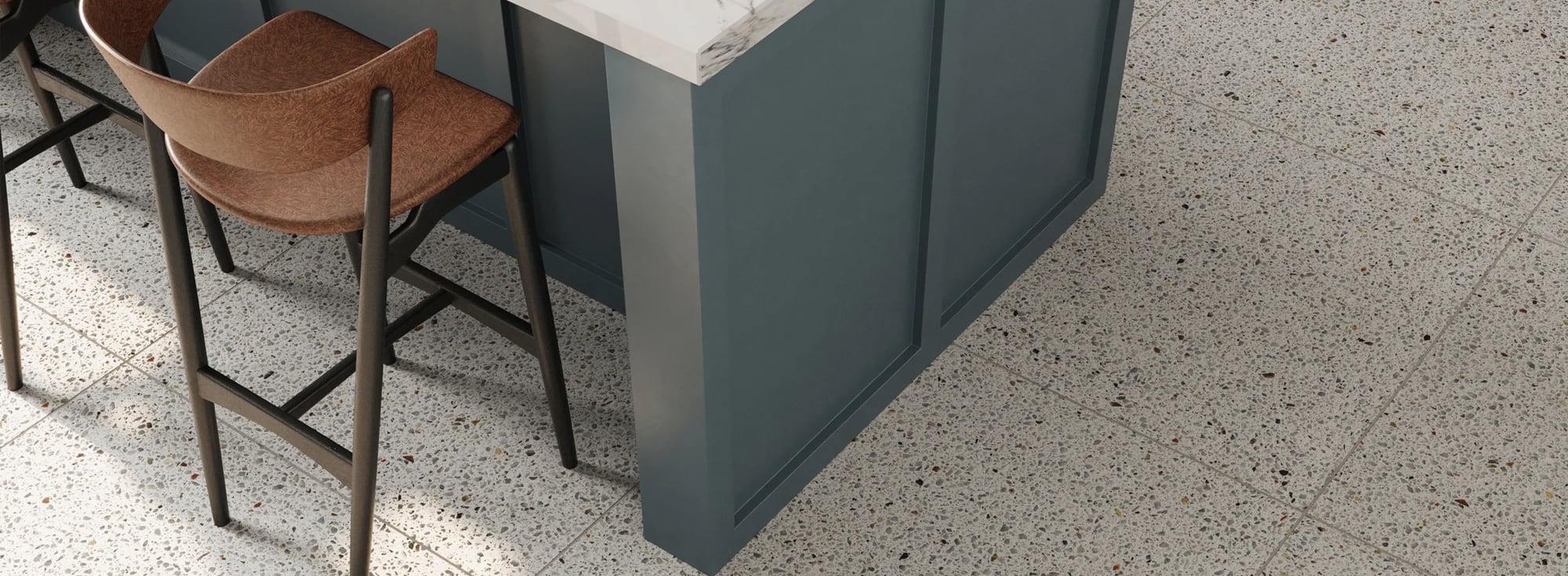 Trendy terrazzo look tile flooring adding speckled charm to a contemporary kitchen