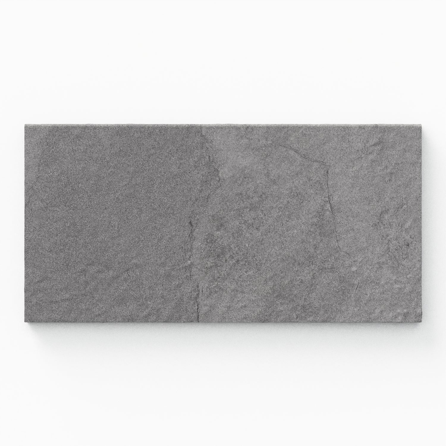 Bowden 12x24 Grip Porcelain 2cm Coping in Graphite, showcasing a deep gray tone with a textured surface for refined outdoor spaces.