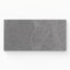 Bowden 12x24 Grip Porcelain 2cm Coping in Graphite, showcasing a deep gray tone with a textured surface for refined outdoor spaces.